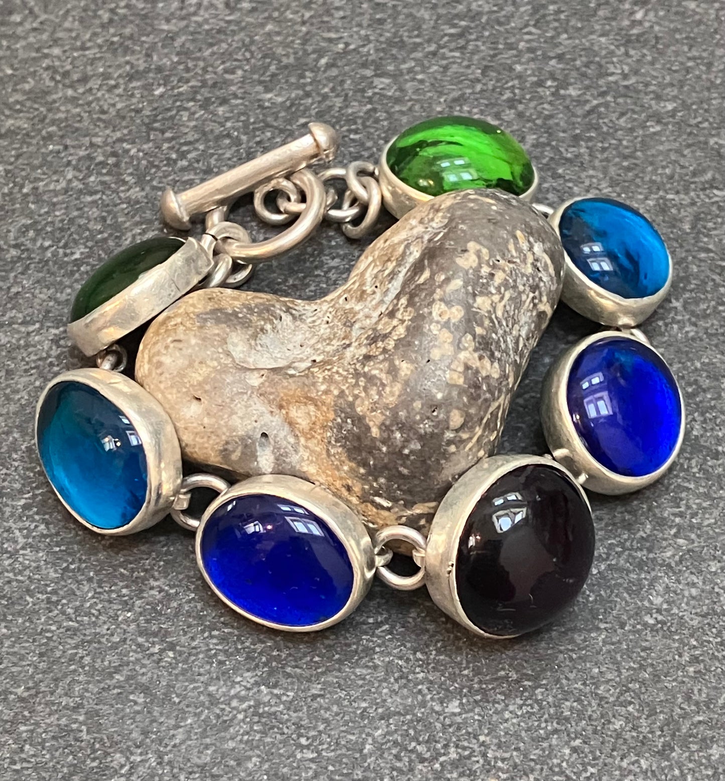 Absolutely stunning vintage sterling silver and glass Mexican bracelet.