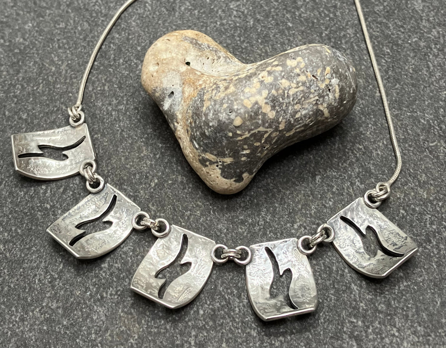 Beautiful vintage sterling silver necklace. Comprising of five beautifully made rectangles.