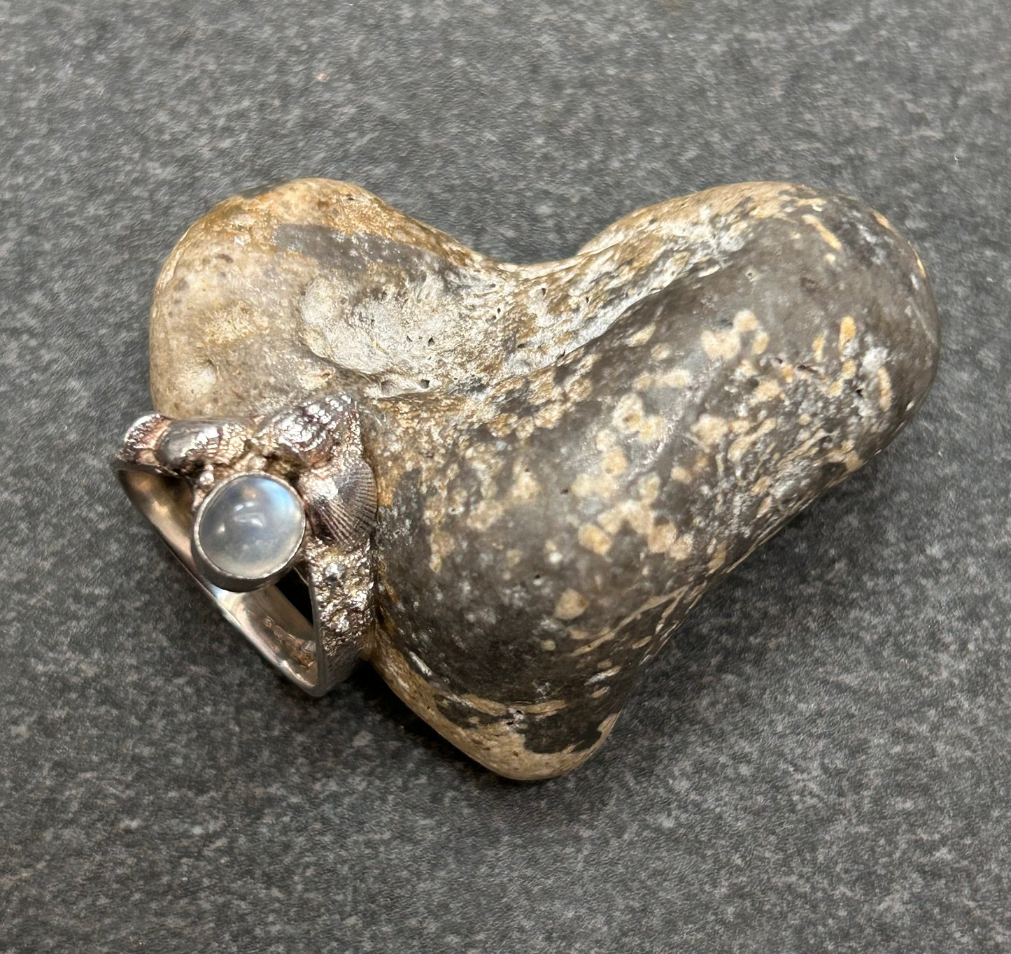 Vintage sterling silver moonstone and shell artisan ring.
