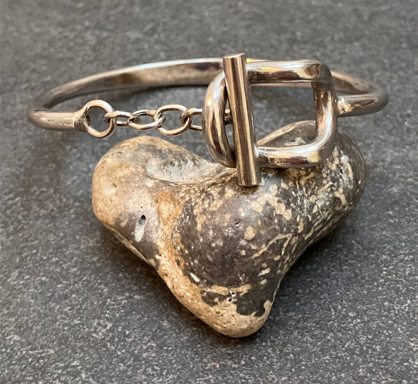 Really unusual vintage sterling silver toggle bangle.