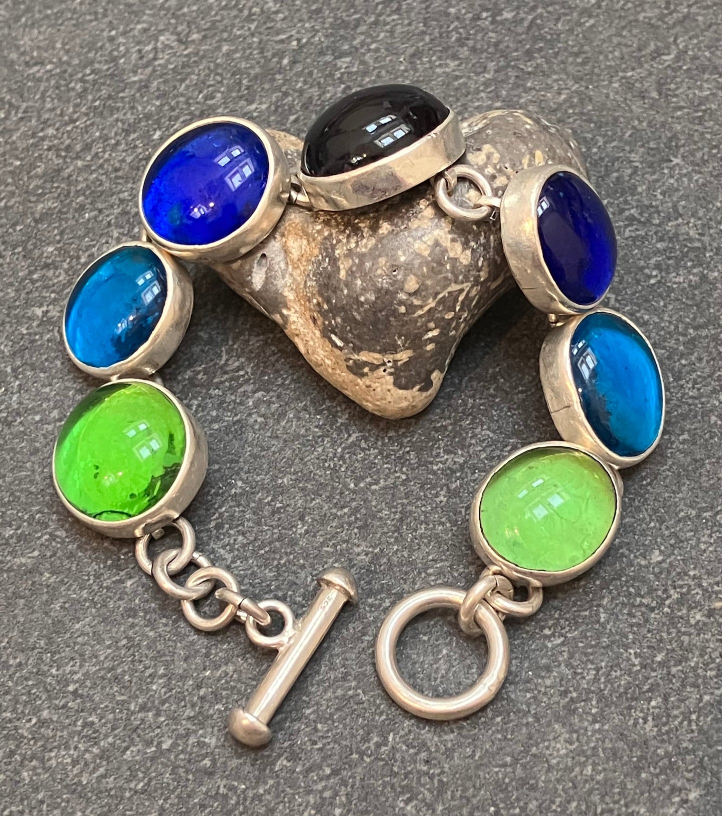 Absolutely stunning vintage sterling silver and glass Mexican bracelet.