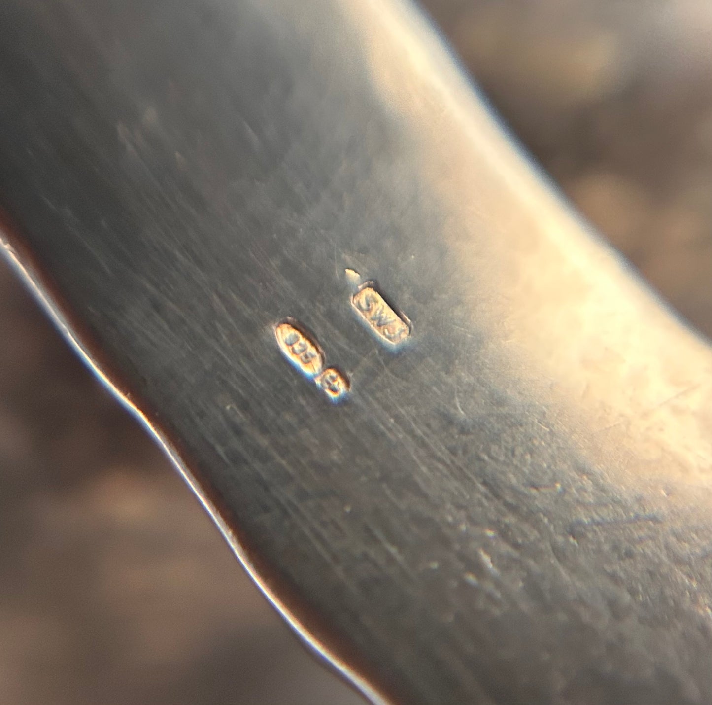 Vintage sterling silver torque bangle.