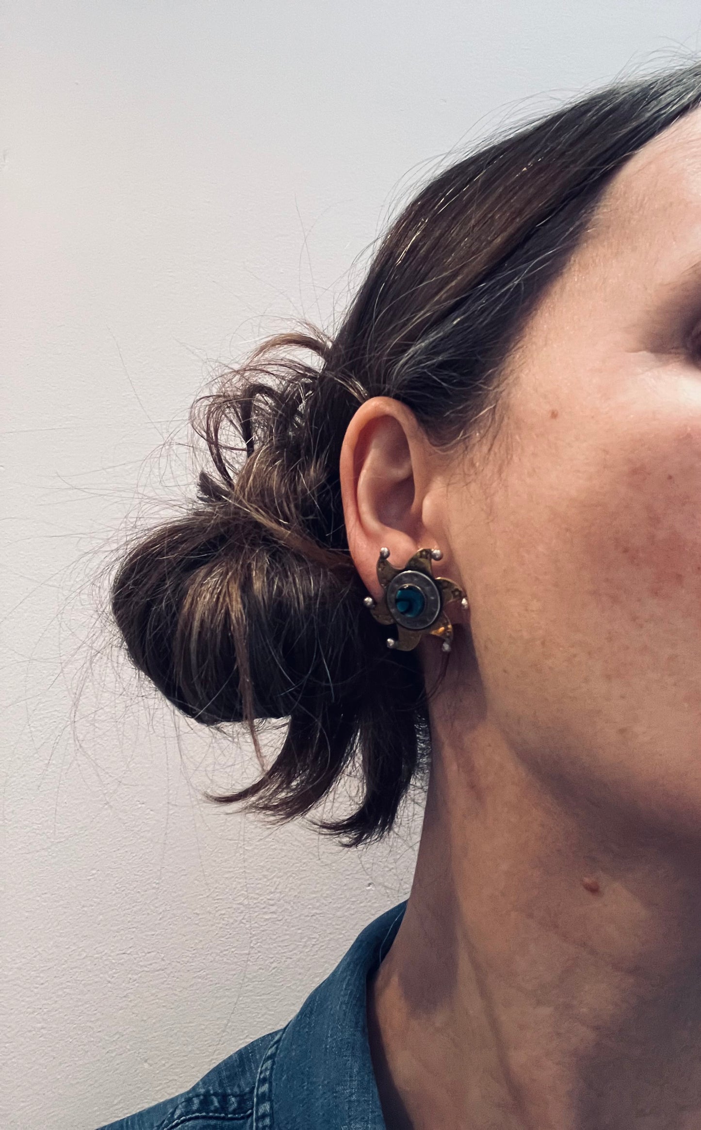 Vintage brass and sterling silver ornate star earrings.