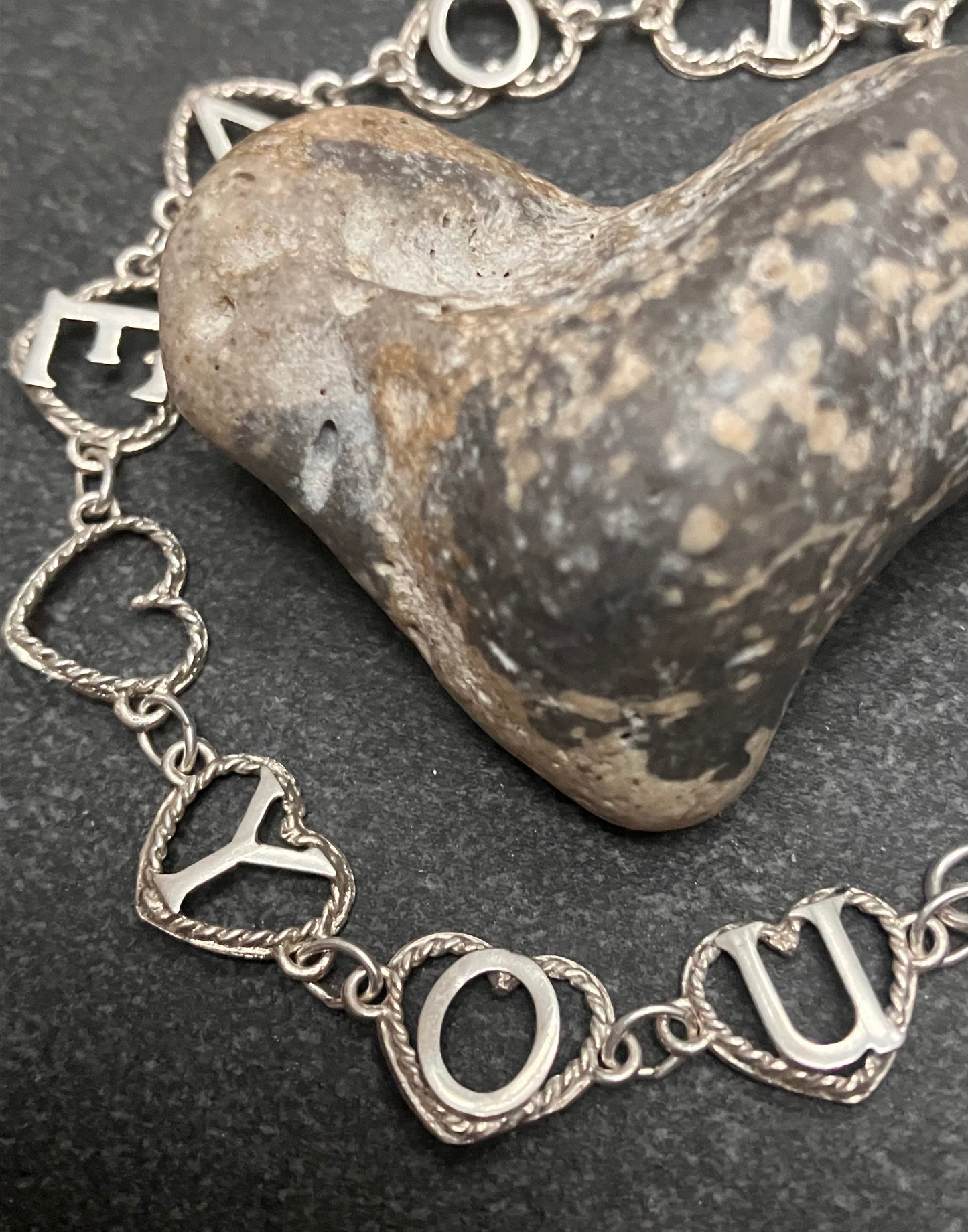 Vintage sterling silver ‘I love you’ bracelet. 1975
