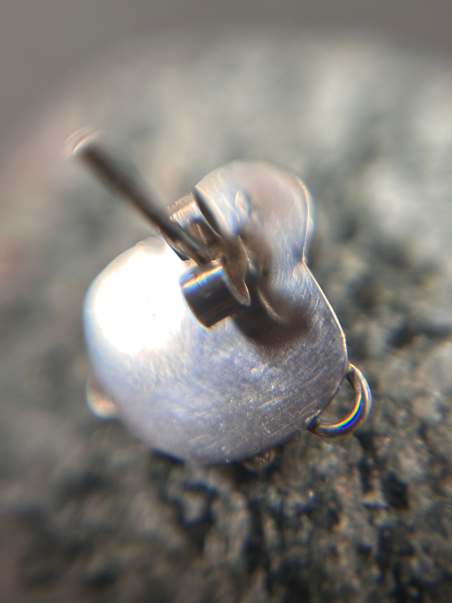 Beautiful sterling silver stud earrings set with cabochon-cut amethysts.