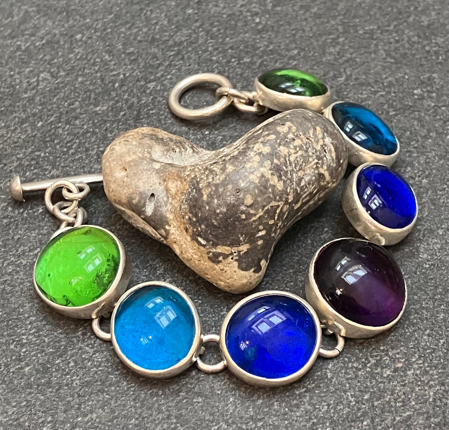 Absolutely stunning vintage sterling silver and glass Mexican bracelet.