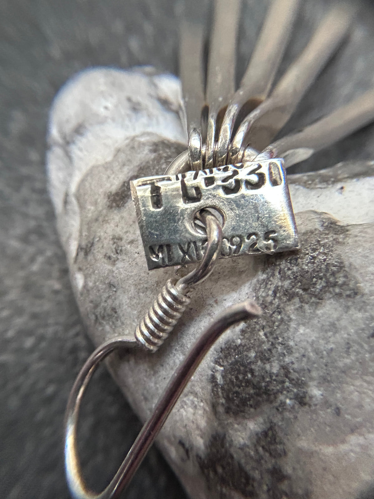 Mexican sterling silver earrings featuring slender bars.