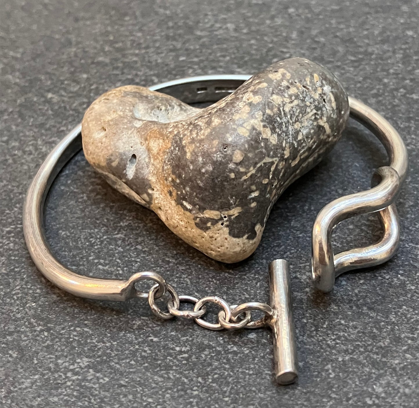 Really unusual vintage sterling silver toggle bangle.