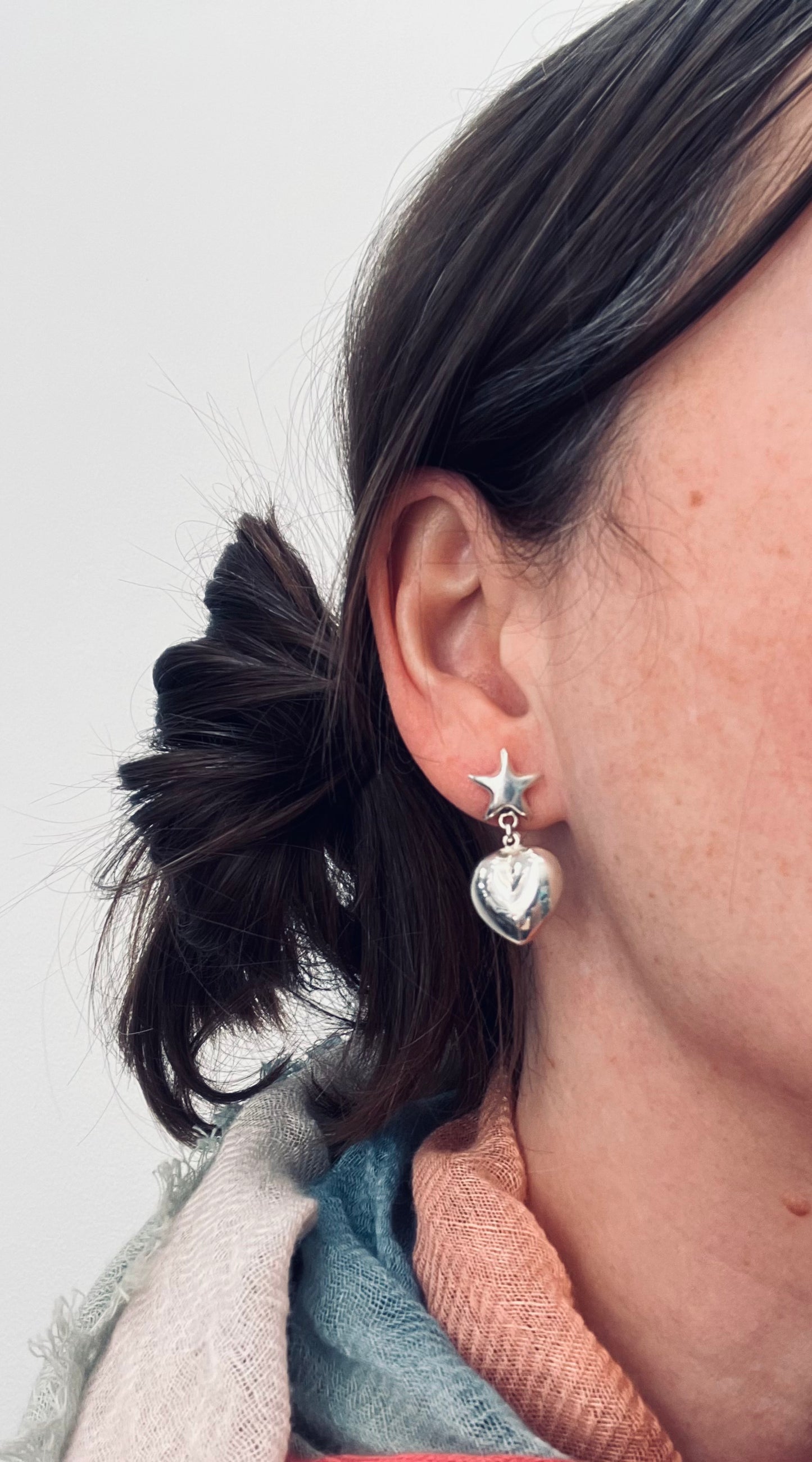 Super vintage sterling silver star and heart earrings.