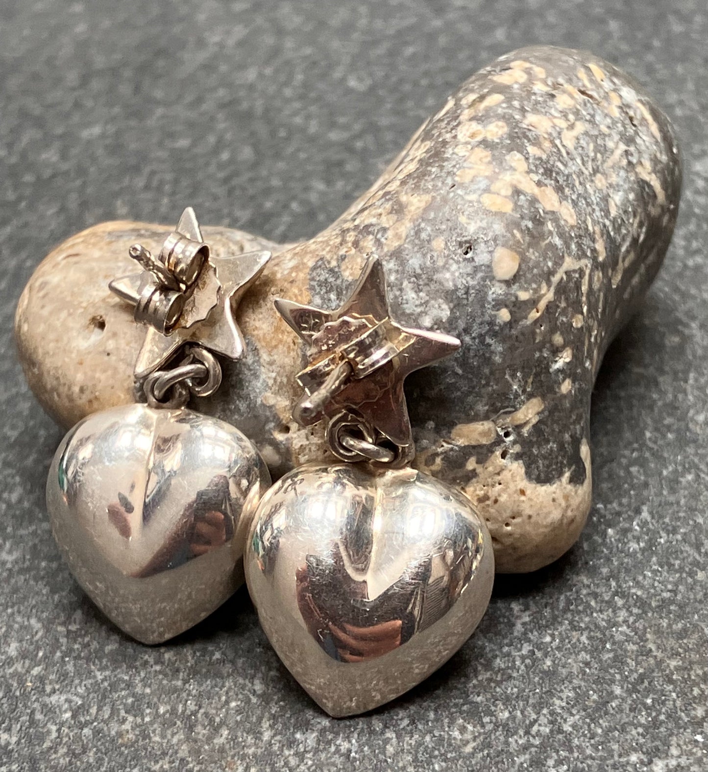 Super vintage sterling silver star and heart earrings.
