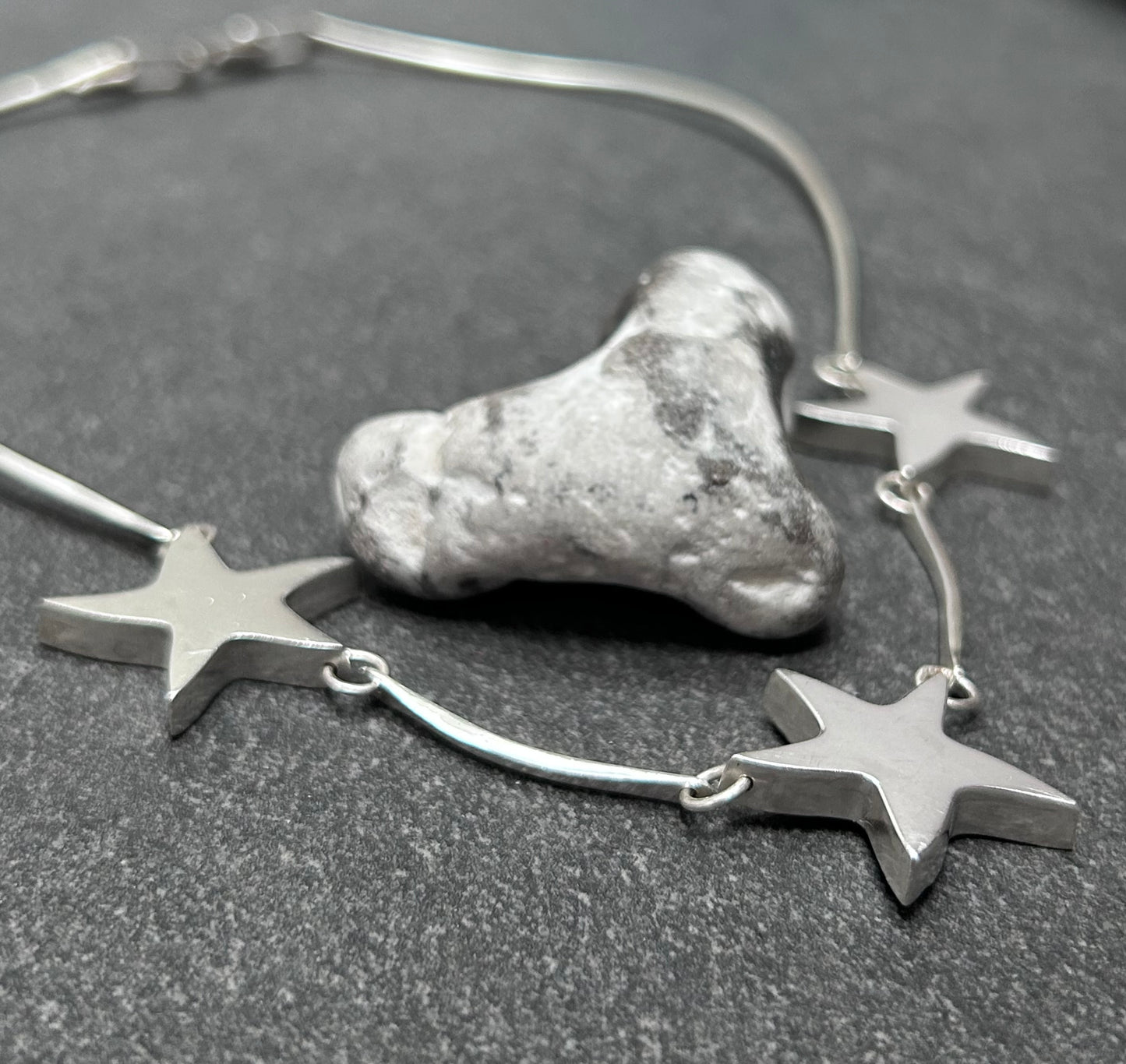 Wonderfully sculptural vintage sterling silver star necklace