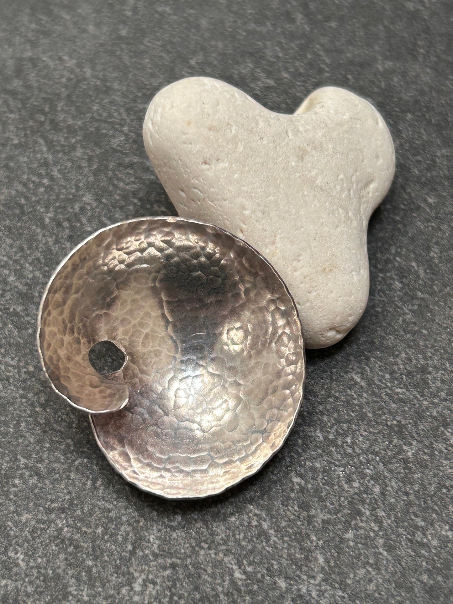 A striking pair of artisan-made vintage sterling silver earrings