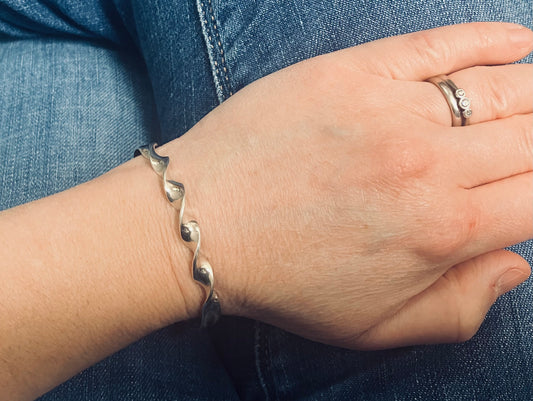 Vintage sterling silver Native American artisan bangle. 1998