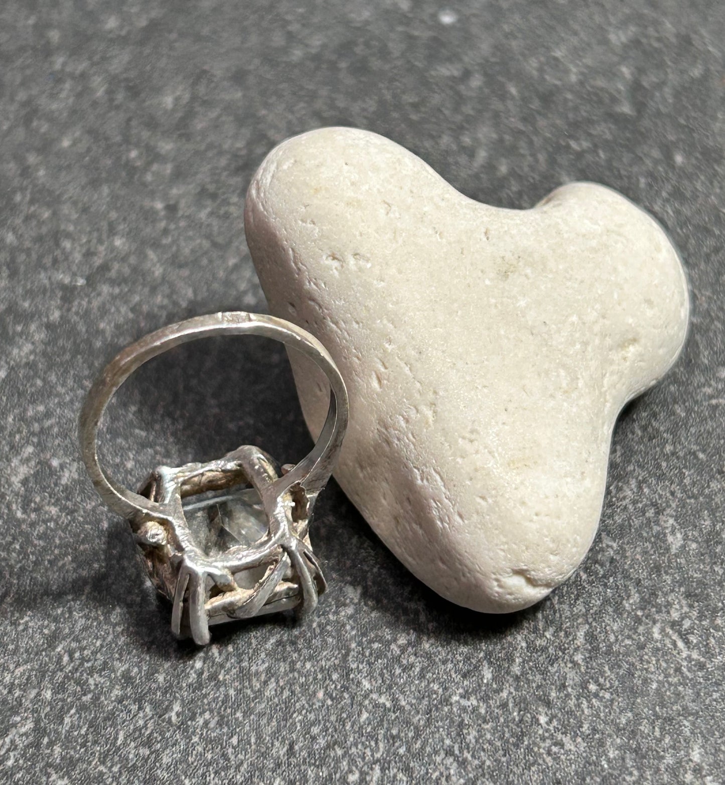 vintage Polish ring is crafted in sterling silver and set with a beautifully cut rectangular quartz crystal