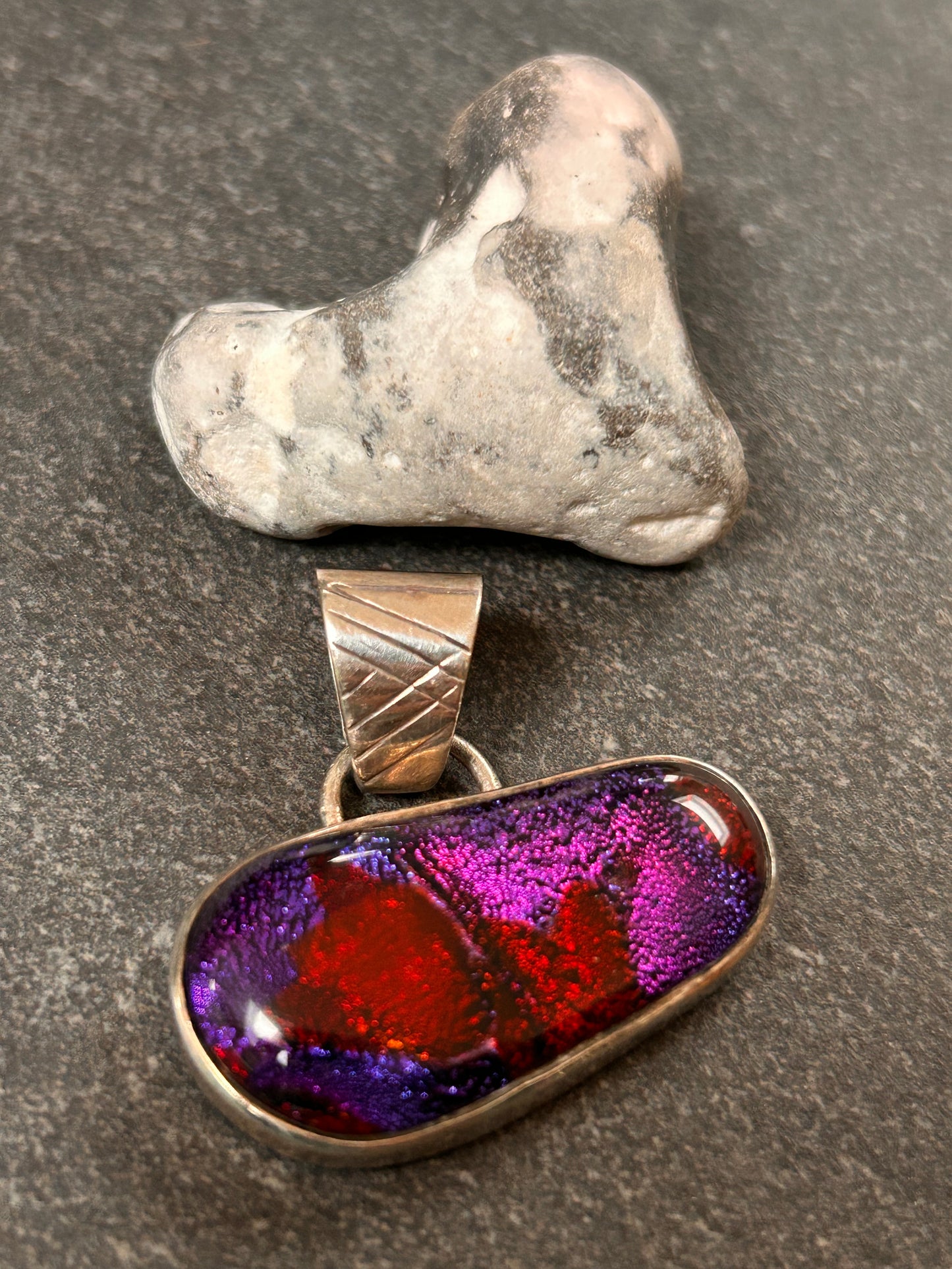 Striking vintage sterling silver dichroic glass pendant