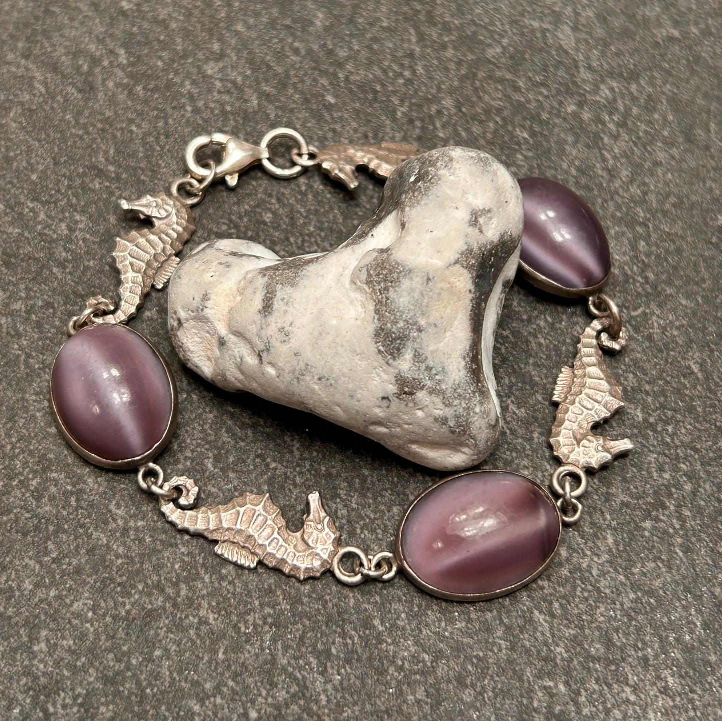 A truly enchanting vintage sterling silver bracelet, featuring four exquisitely detailed seahorses