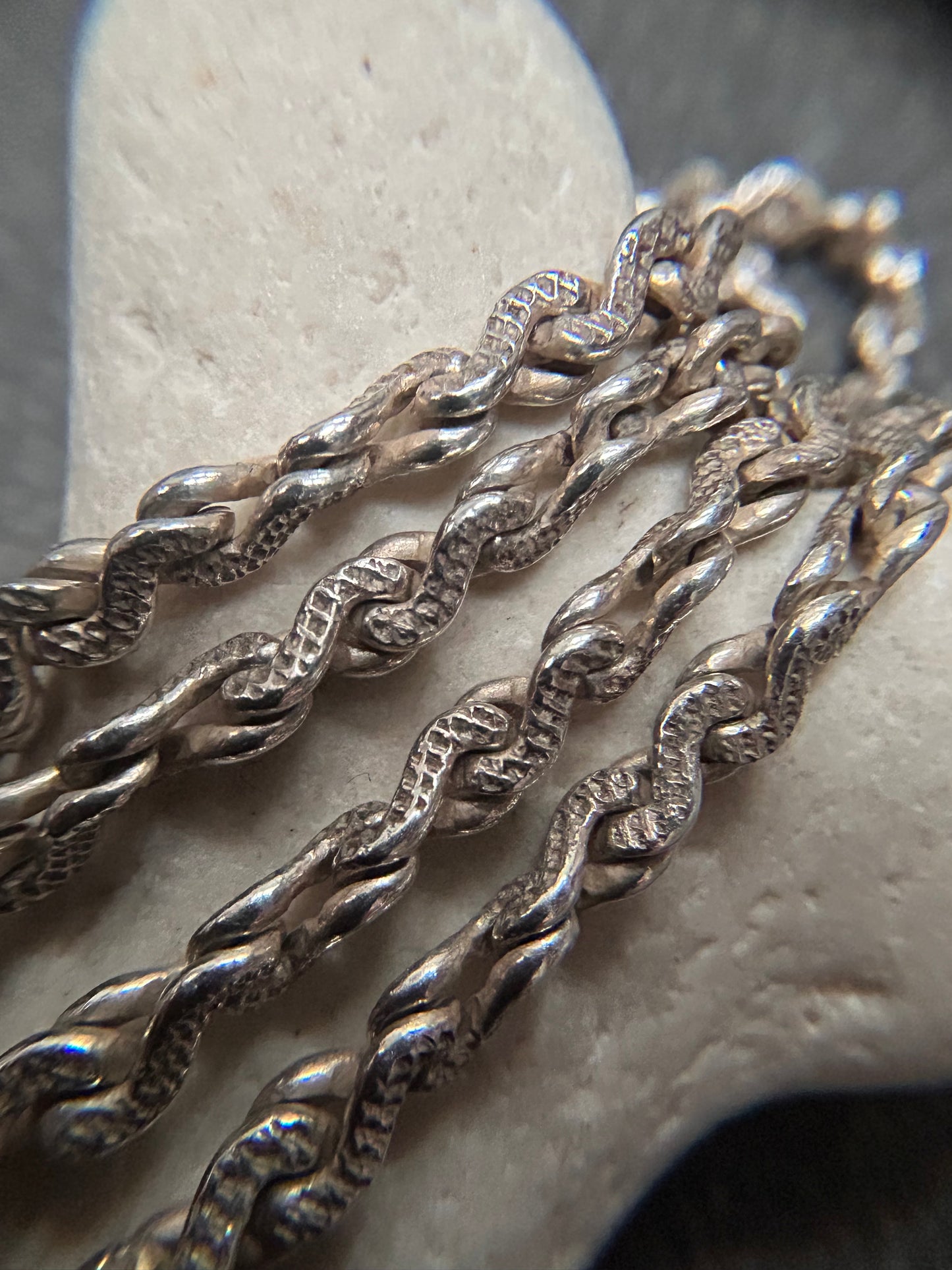 Beautiful vintage sterling silver necklace features elegant infinity links