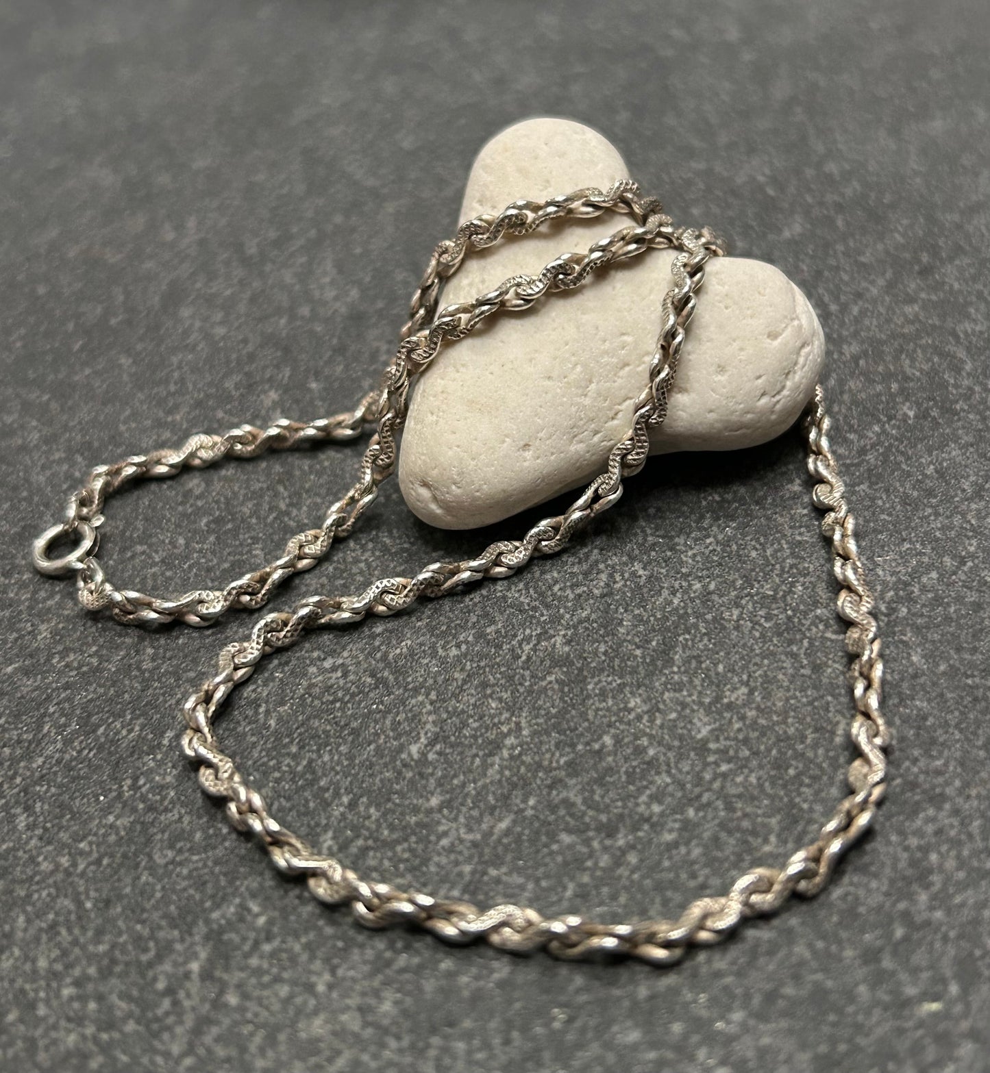 Beautiful vintage sterling silver necklace features elegant infinity links