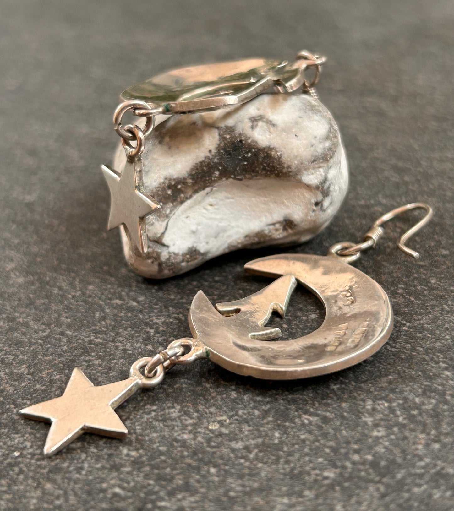 Fantastic vintage sterling silver Mexican earrings featuring a wonderfully whimsical celestial design of a howling wolf nestled within a crescent moon
