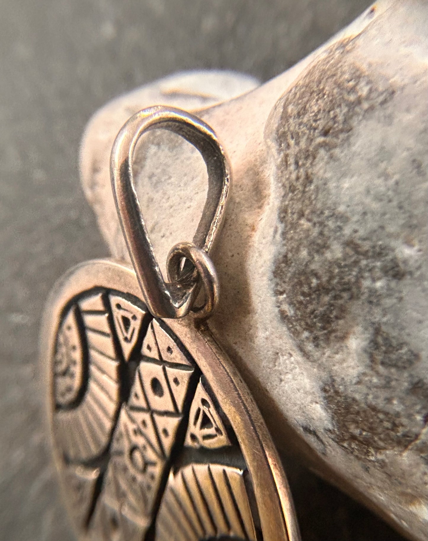 A beautifully crafted vintage sterling silver circular pendant