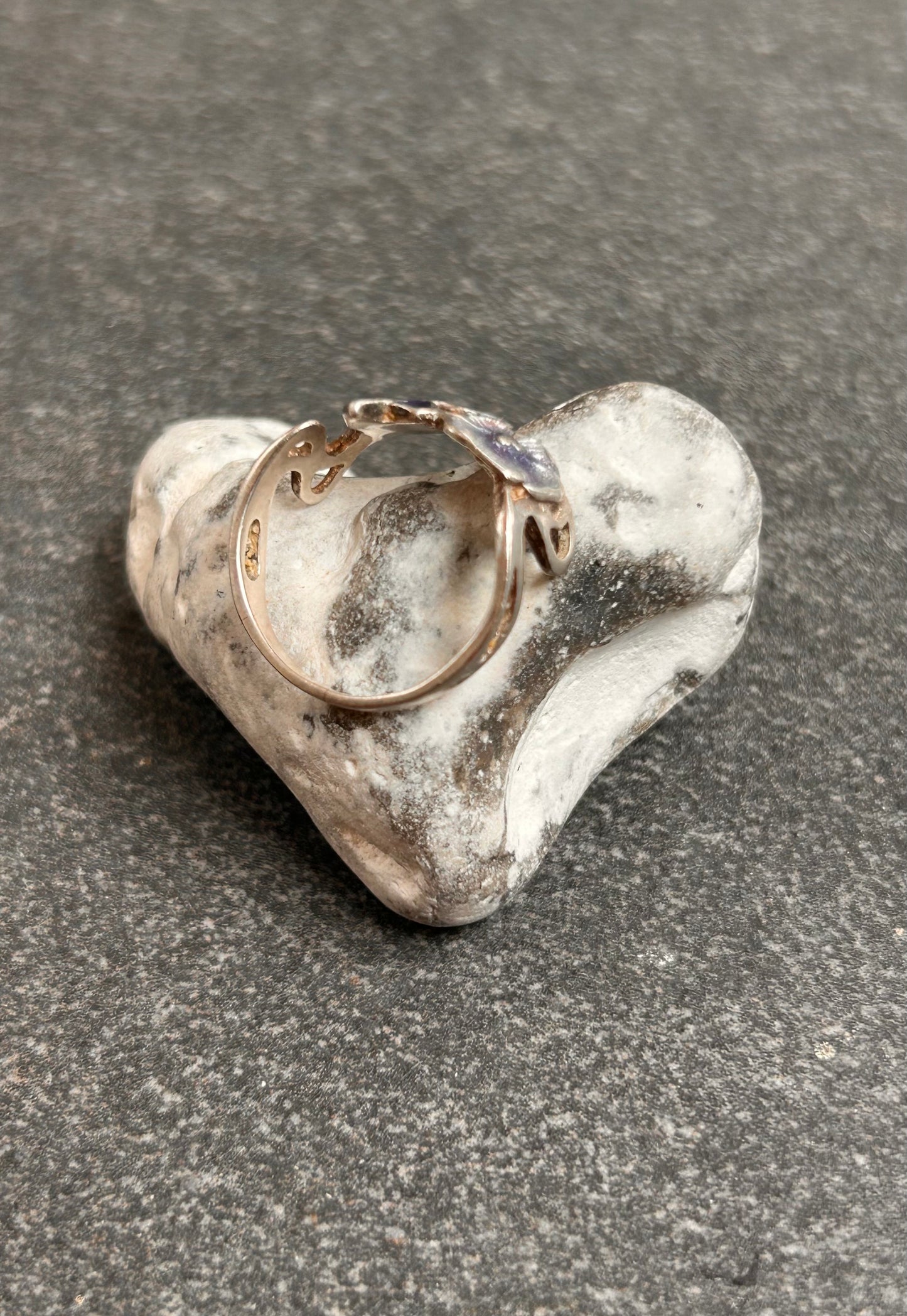 A beautiful and delicate vintage sterling silver ring by renowned silversmith and enamel artist Pat Cheney.