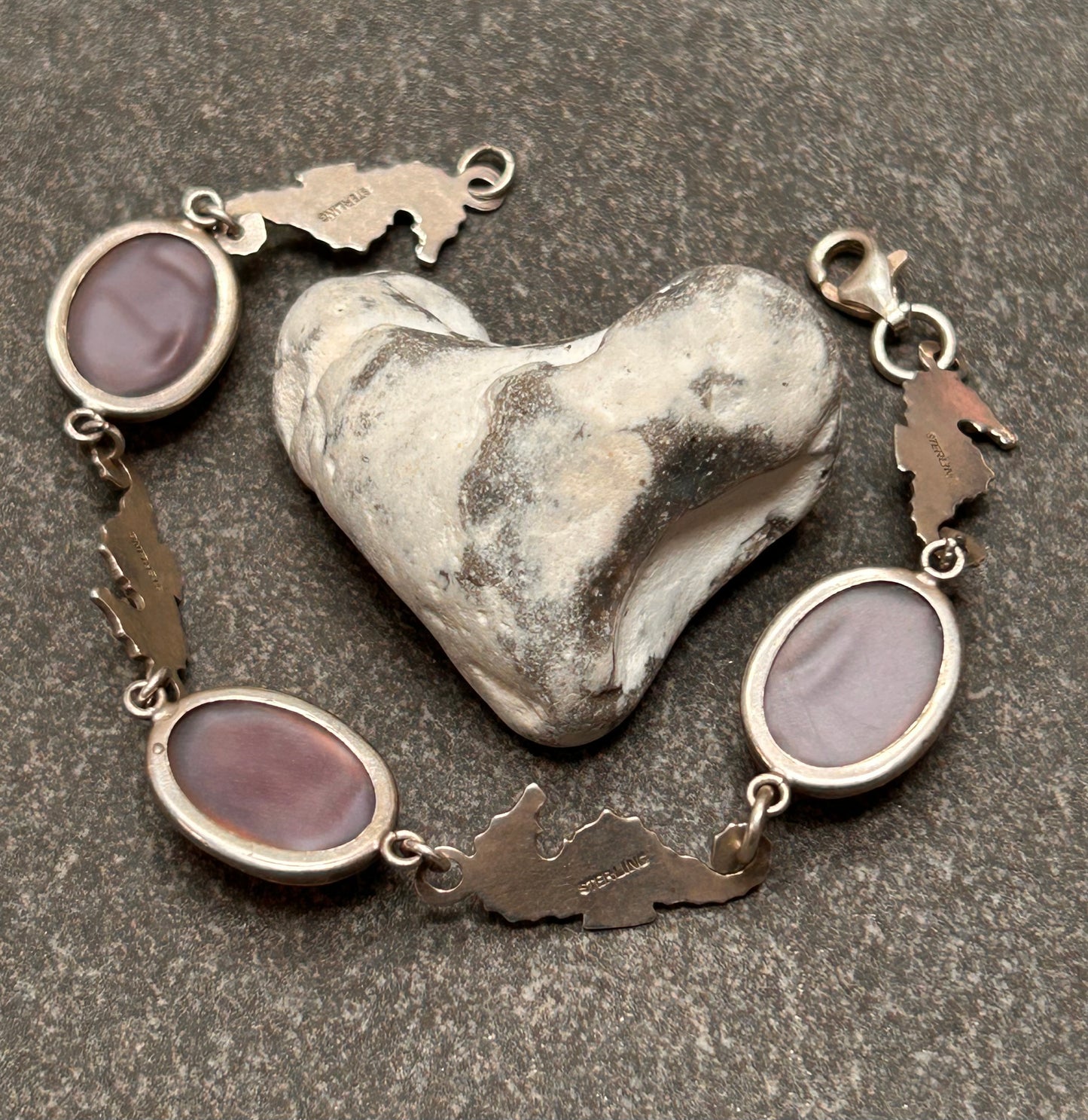 A truly enchanting vintage sterling silver bracelet, featuring four exquisitely detailed seahorses