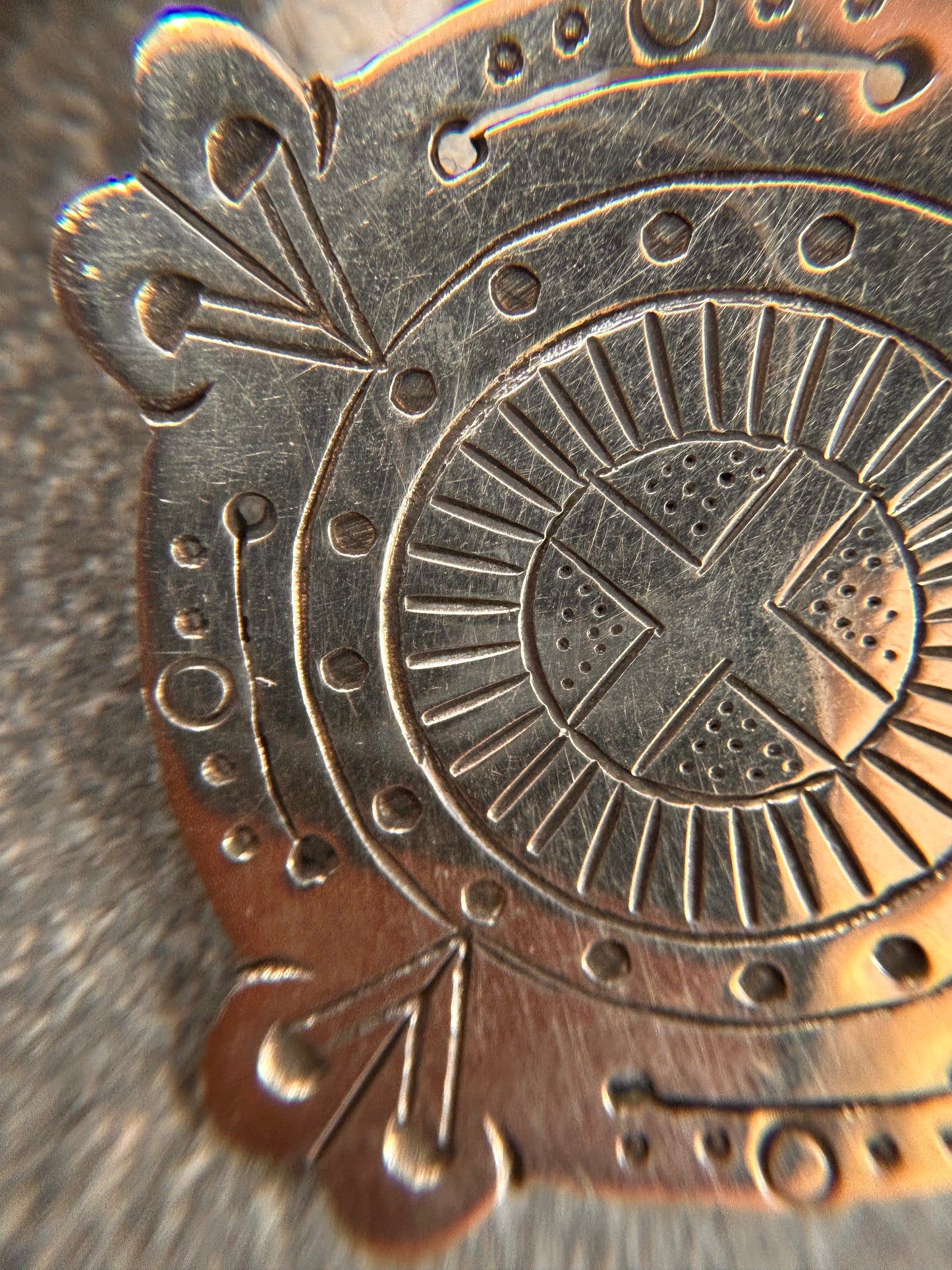 A captivating vintage sterling silver bohemian pendant featuring the ancient sun cross