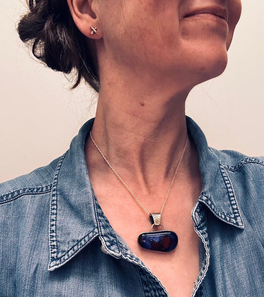 Striking vintage sterling silver dichroic glass pendant
