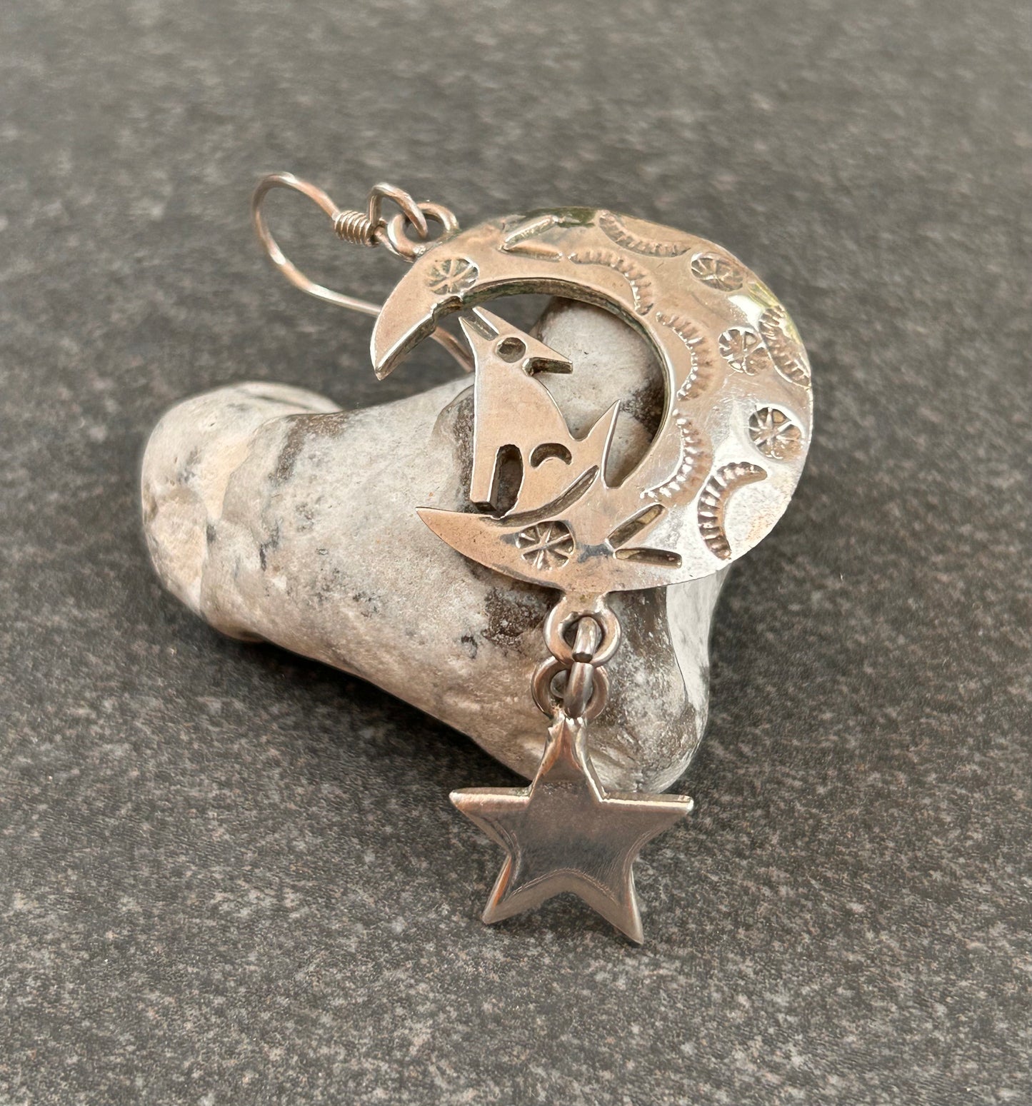 Fantastic vintage sterling silver Mexican earrings featuring a wonderfully whimsical celestial design of a howling wolf nestled within a crescent moon