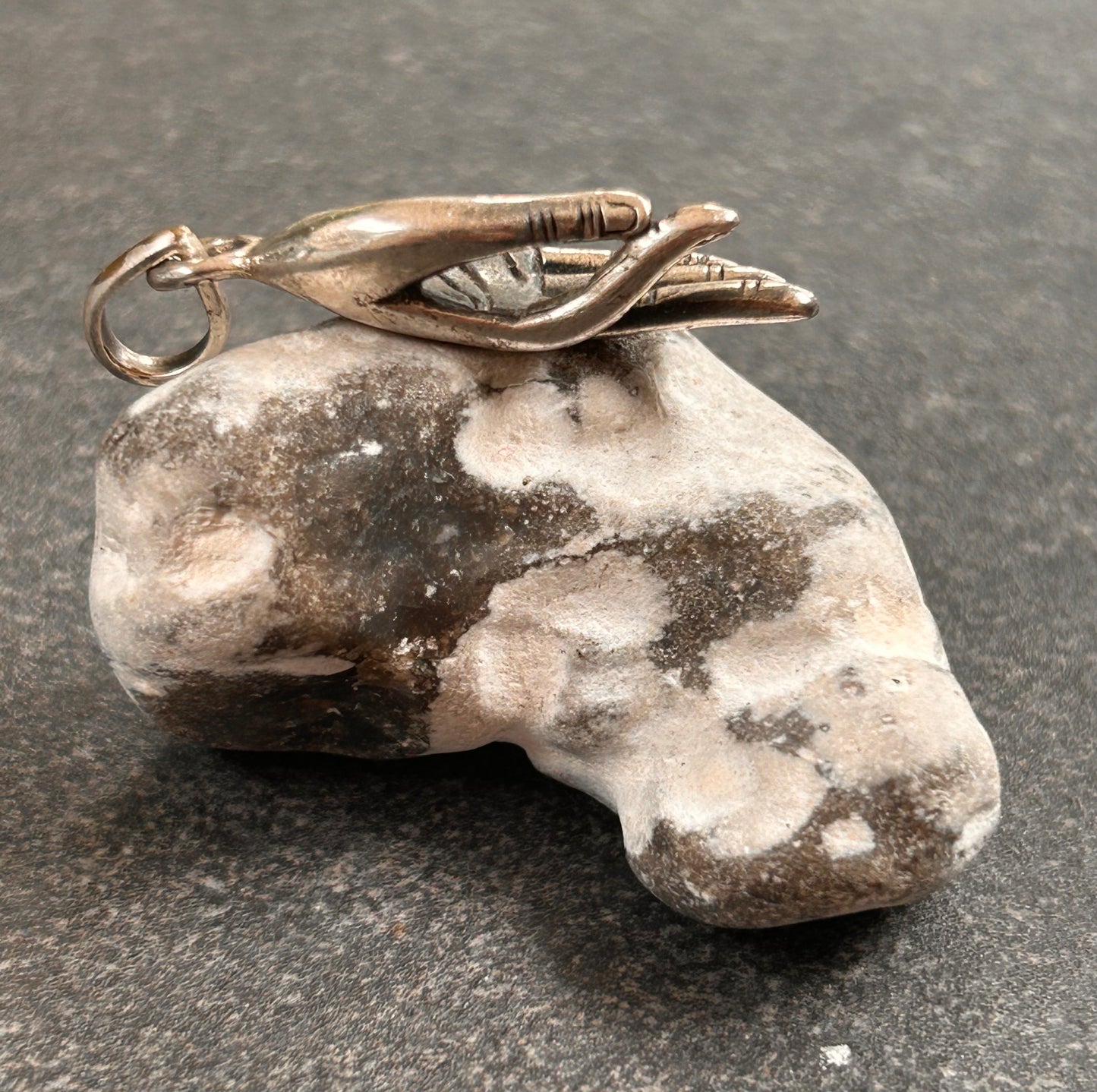 Vintage Hand Pendant
Beautiful vintage hand pendant with index finger and thumb pinched into an elegant pose.