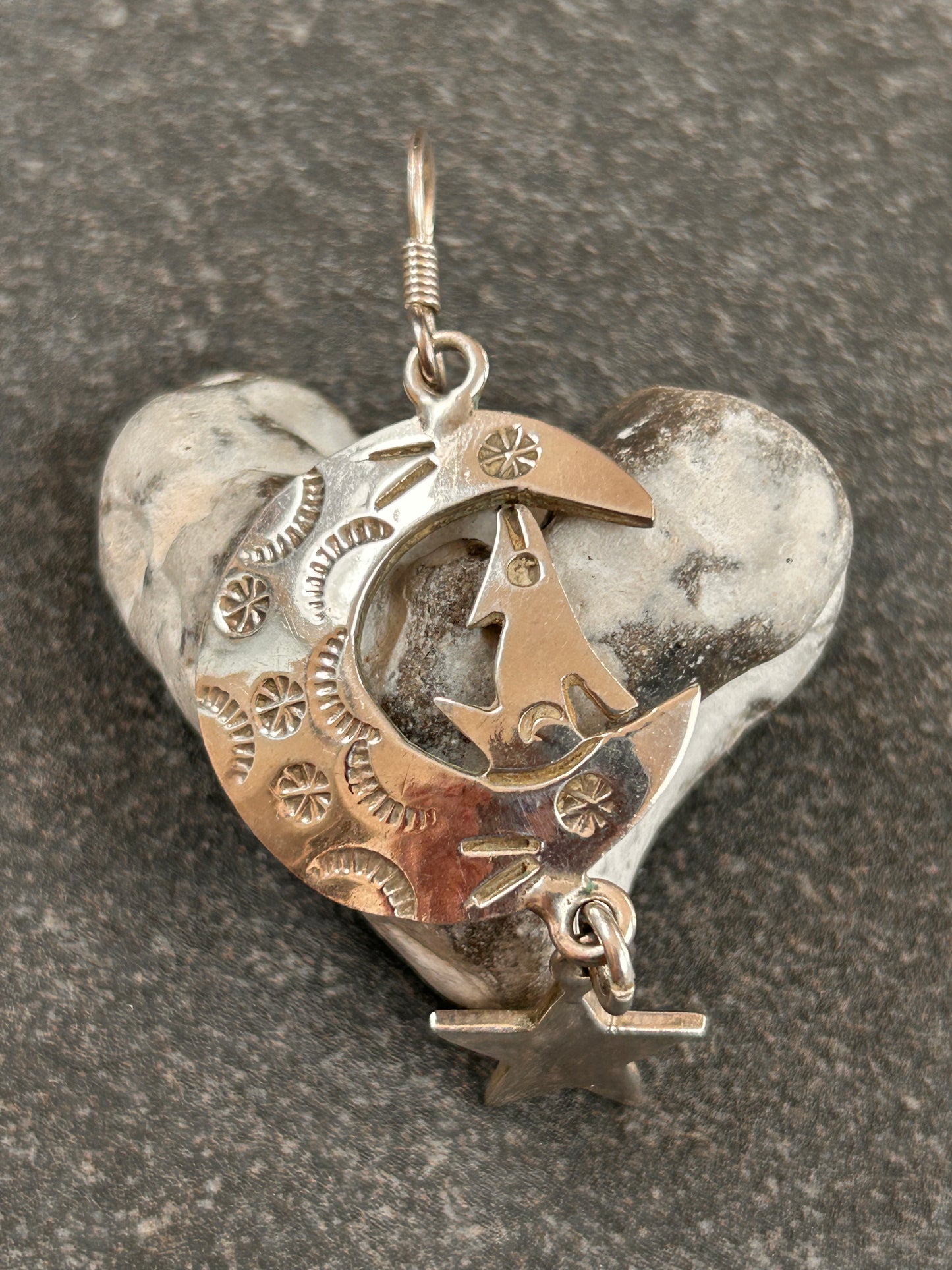 Fantastic vintage sterling silver Mexican earrings featuring a wonderfully whimsical celestial design of a howling wolf nestled within a crescent moon