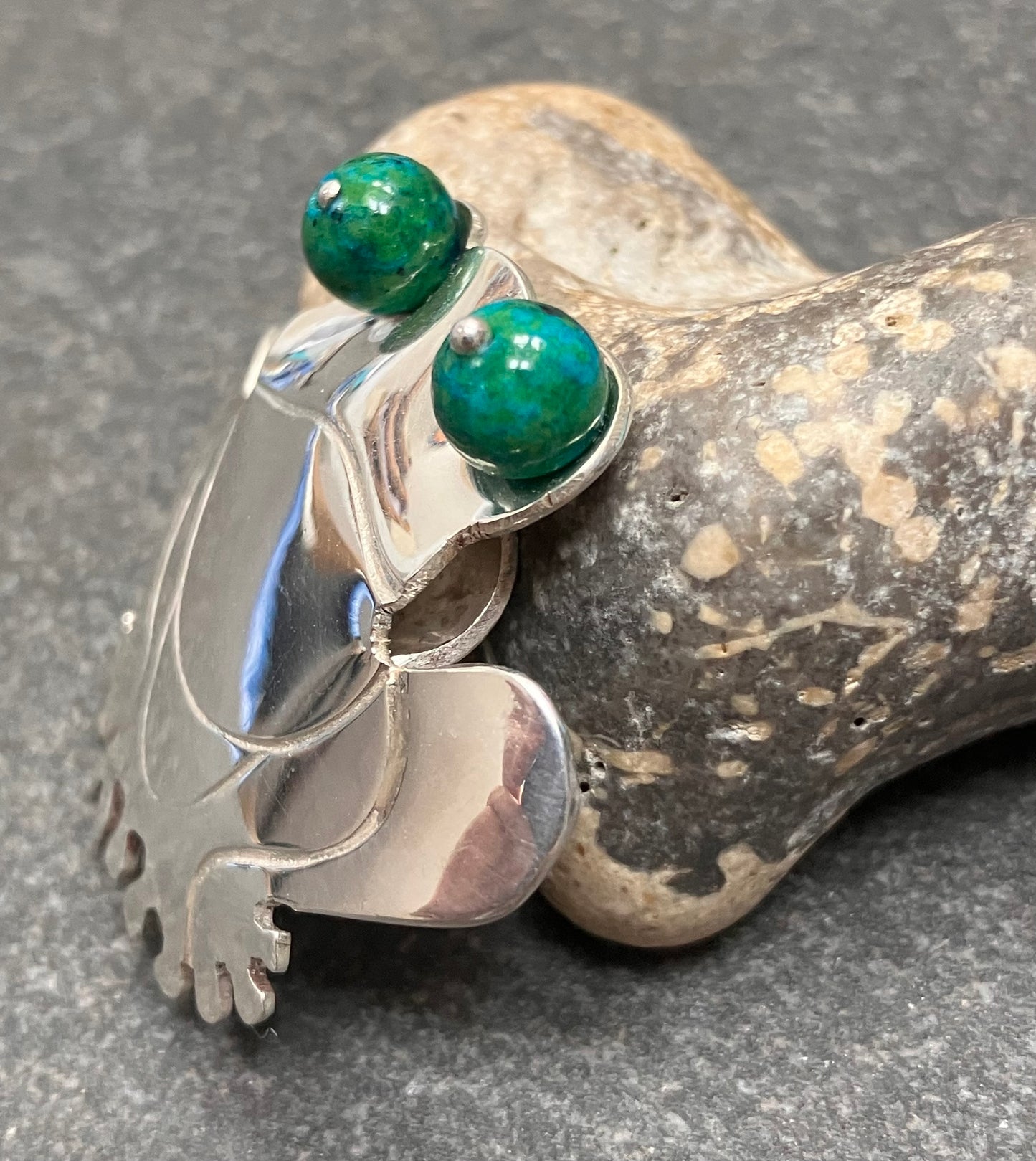 Vintage sterling silver frog pendant with chrysocolla stone sphere eyes.