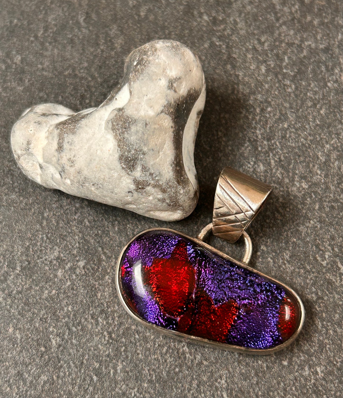 Striking vintage sterling silver dichroic glass pendant