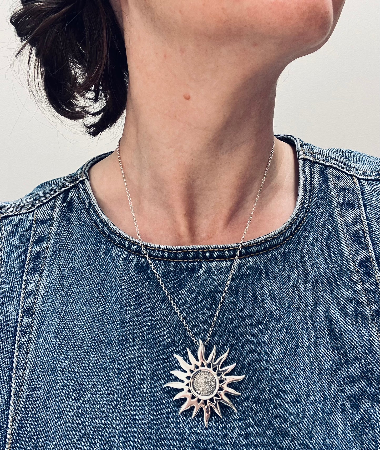 Vintage sterling silver abstract sun or sunflower.