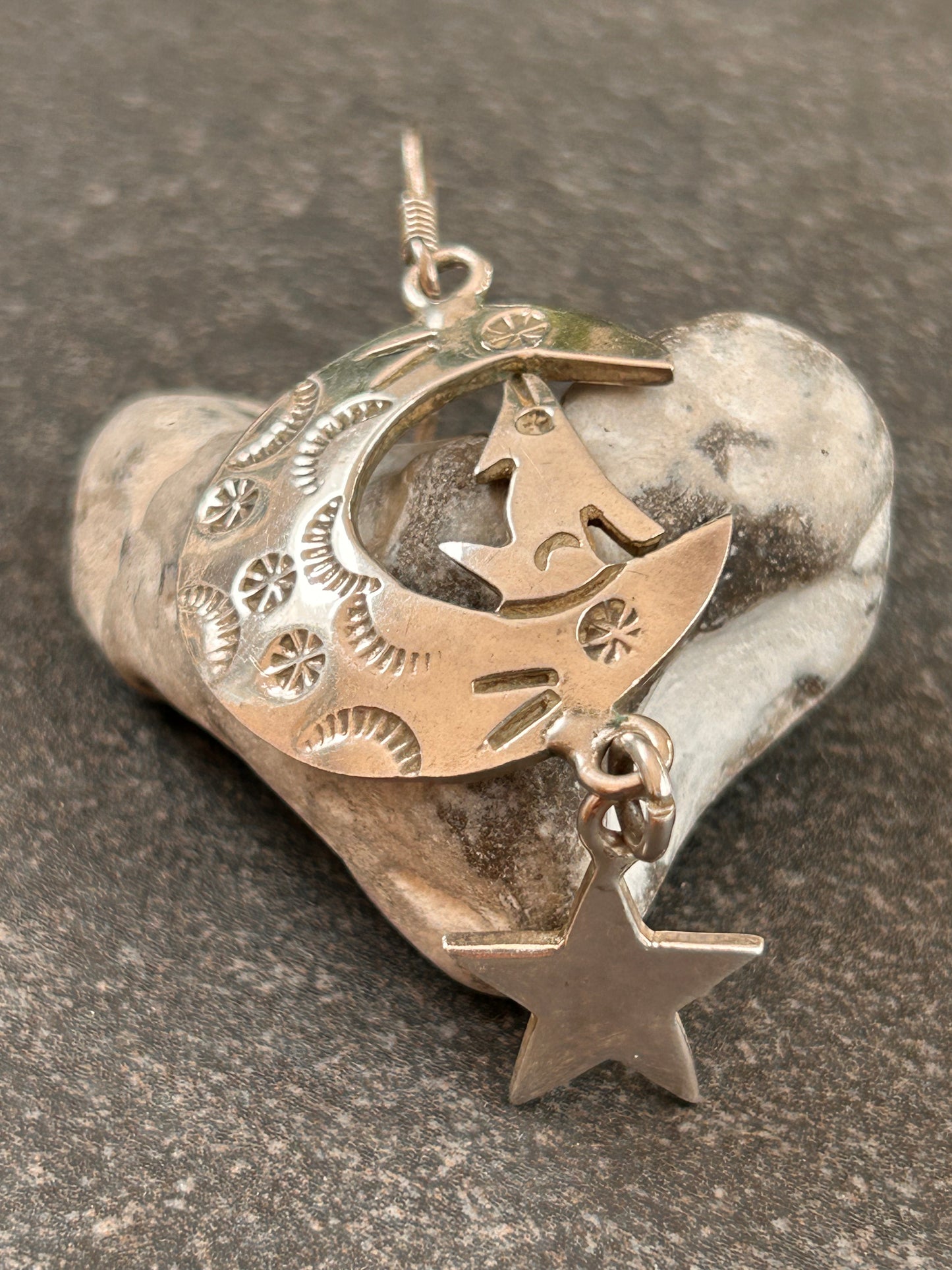 Fantastic vintage sterling silver Mexican earrings featuring a wonderfully whimsical celestial design of a howling wolf nestled within a crescent moon