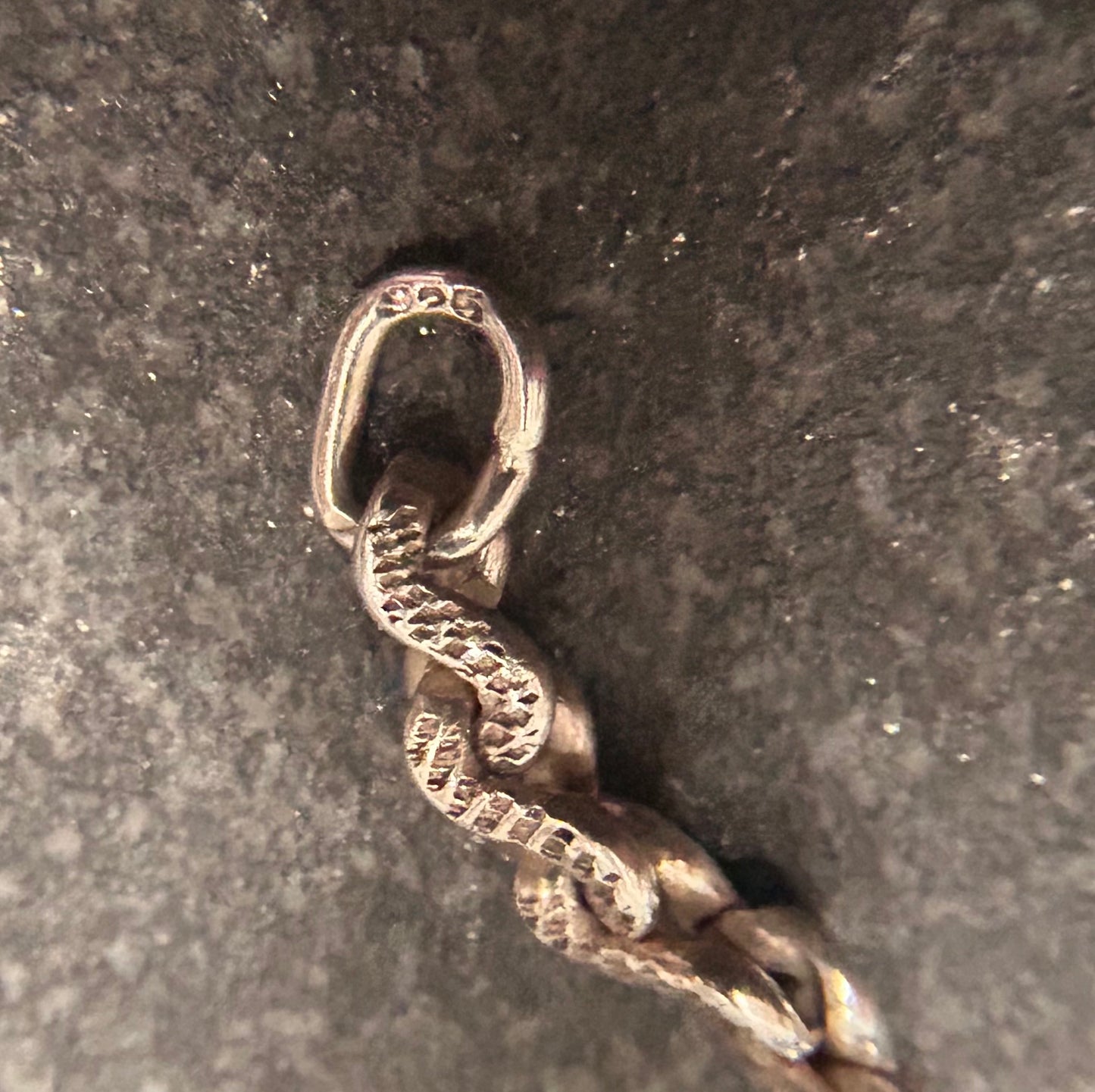 Beautiful vintage sterling silver necklace features elegant infinity links