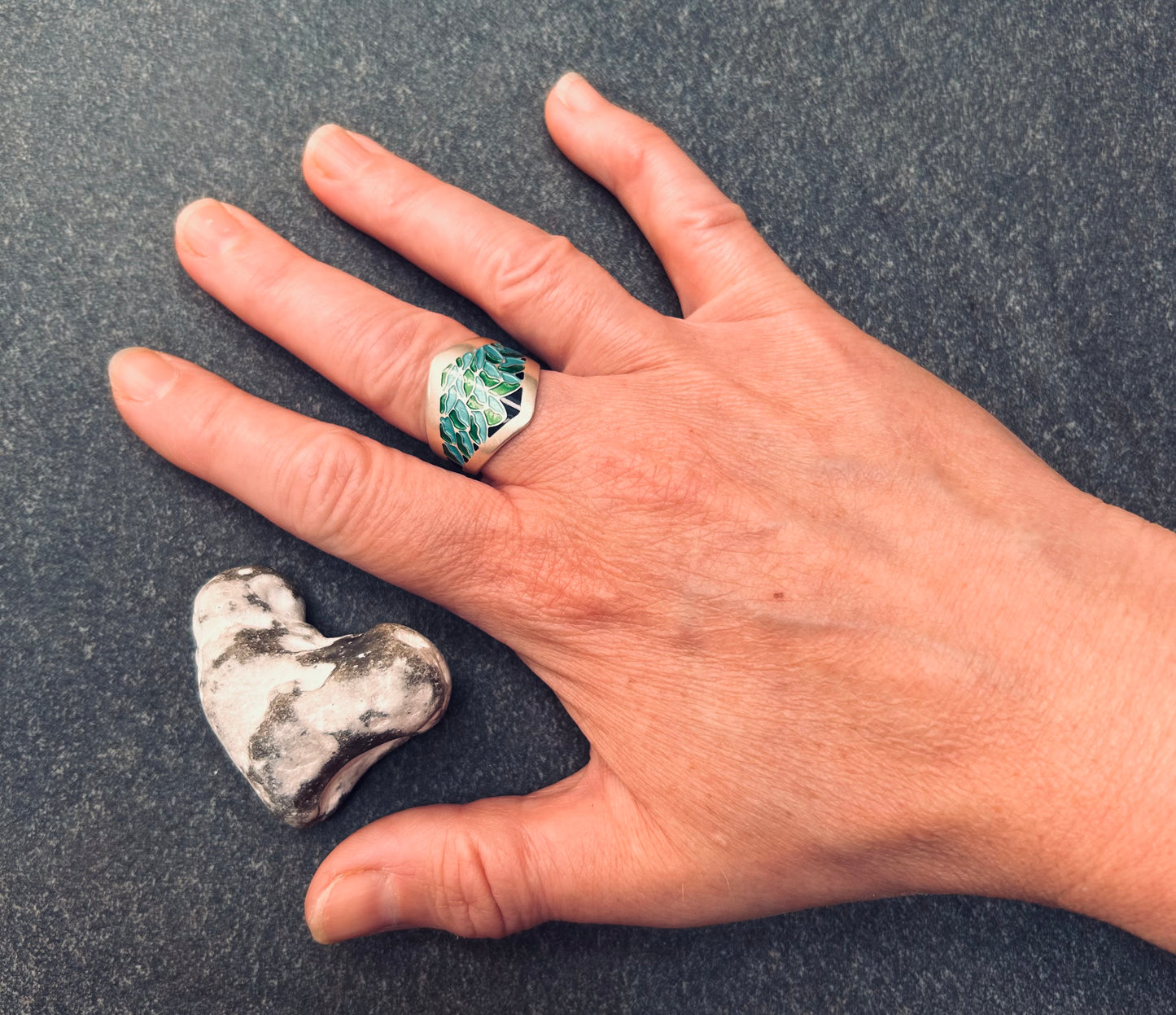 A fantastically detailed vintage sterling silver and enamel ring.