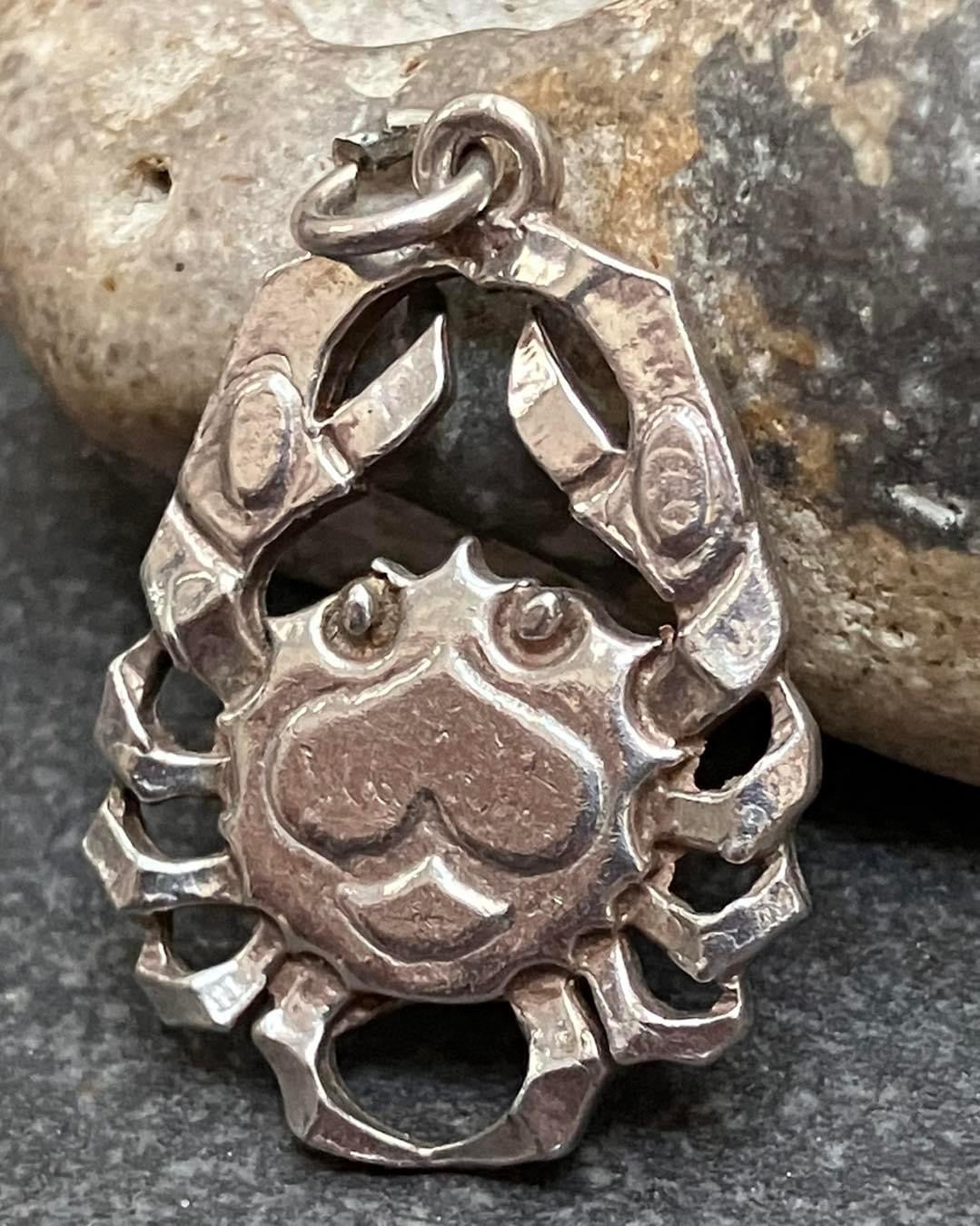 Vintage sterling silver artisan crab pendant.