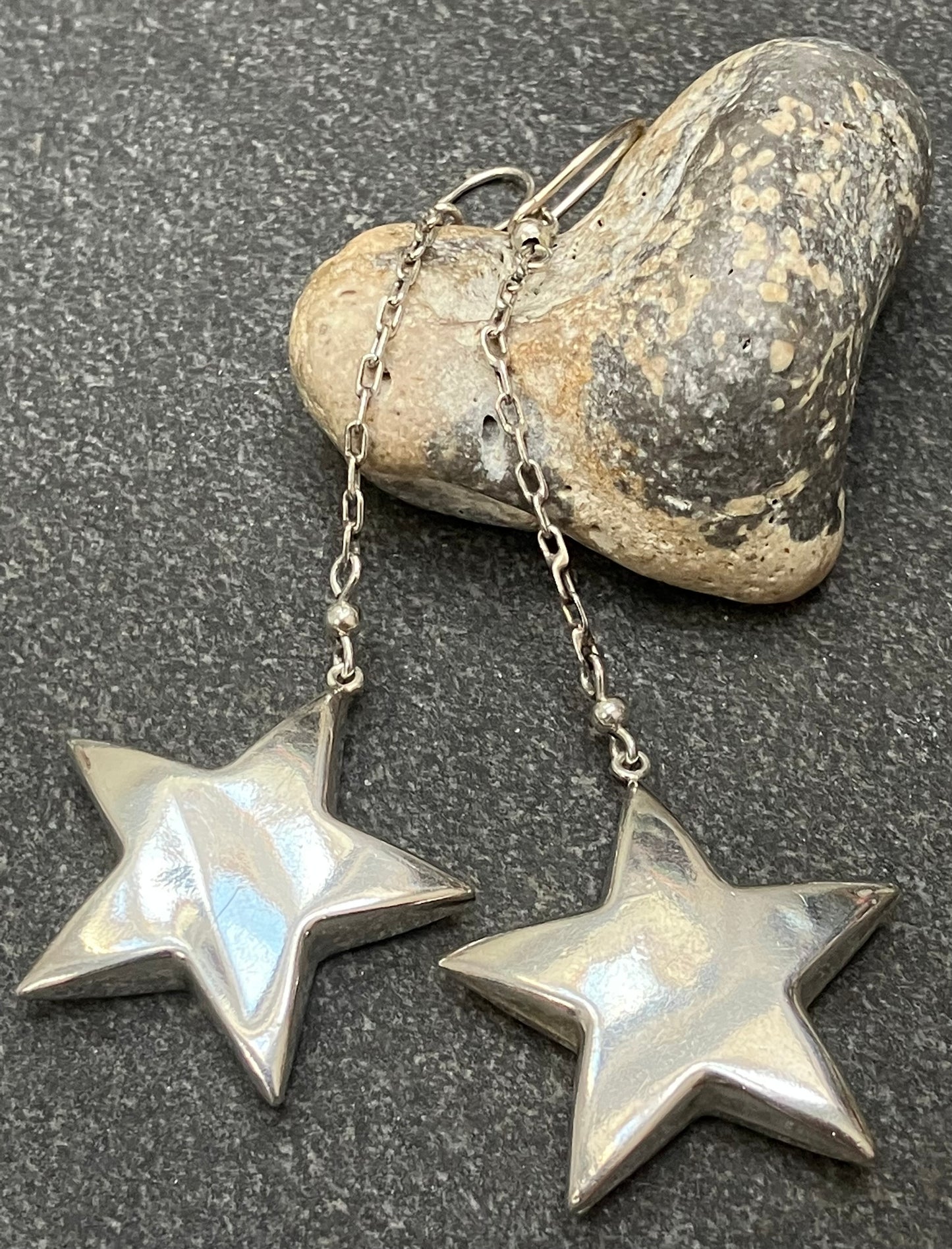 Absolutely fabulous statement vintage sterling silver star earrings.