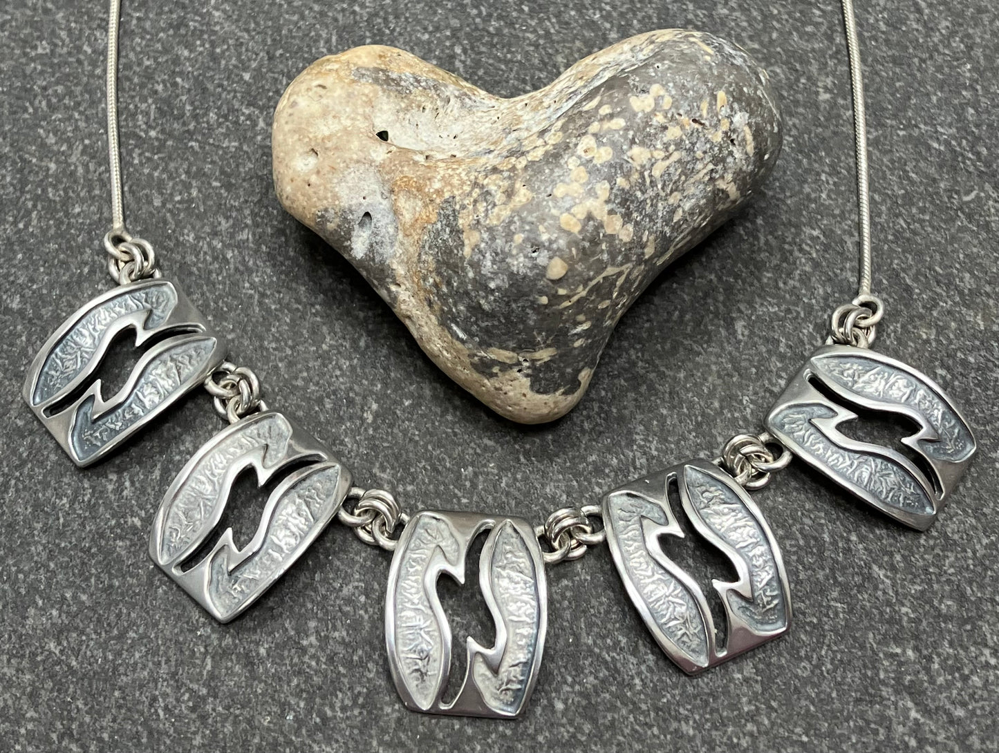 Beautiful vintage sterling silver necklace. Comprising of five beautifully made rectangles.