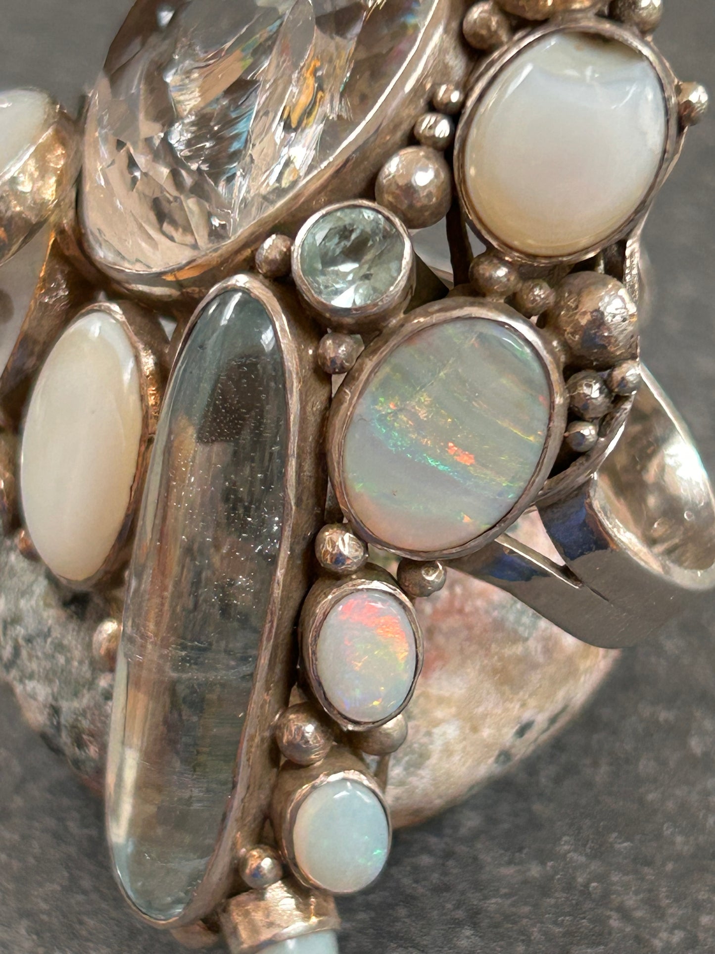 Spectacular Polish Artisan Double-Finger Ring.
Sterling Silver, Rock Crystal, Topaz, Opals, Aquamarine & Pearls.
