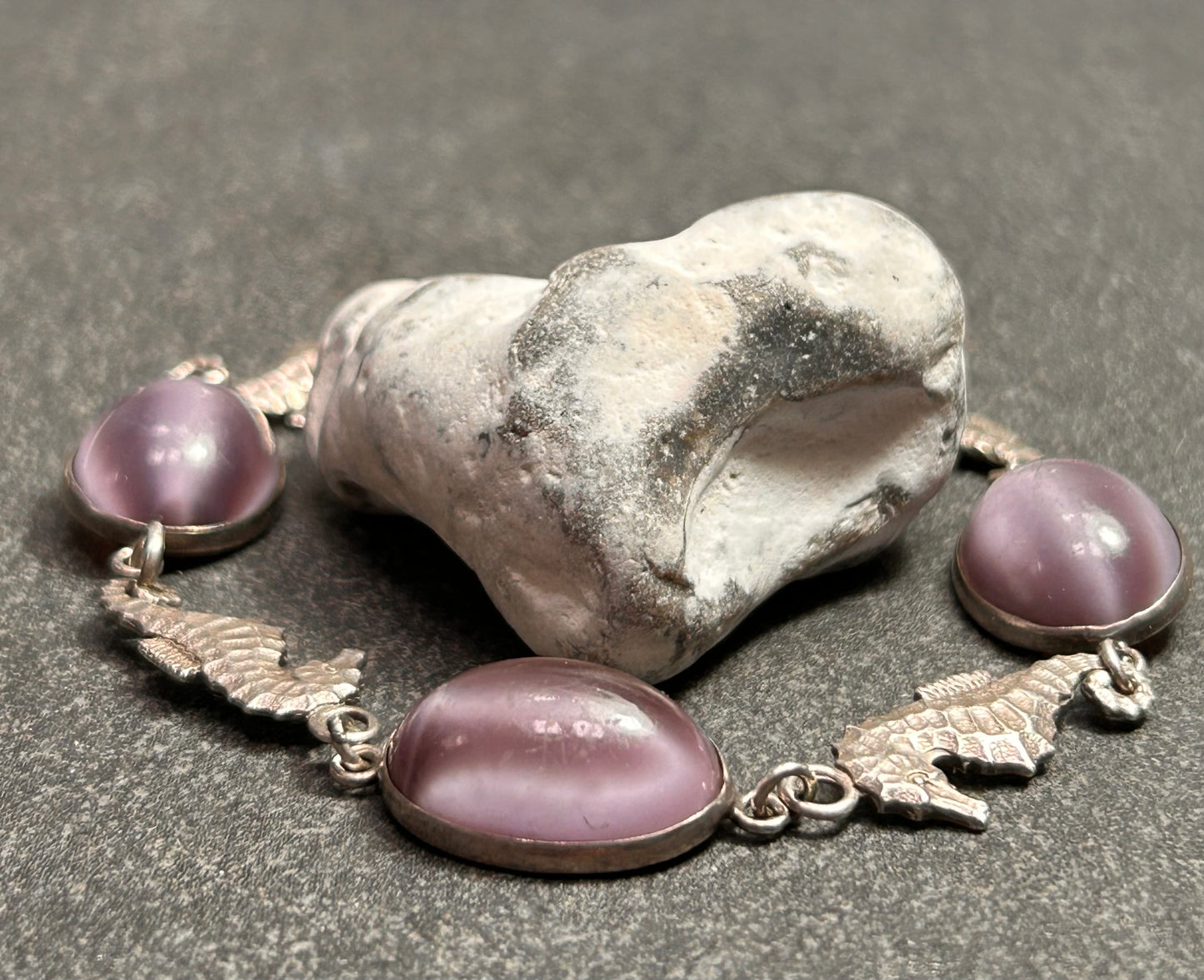 A truly enchanting vintage sterling silver bracelet, featuring four exquisitely detailed seahorses