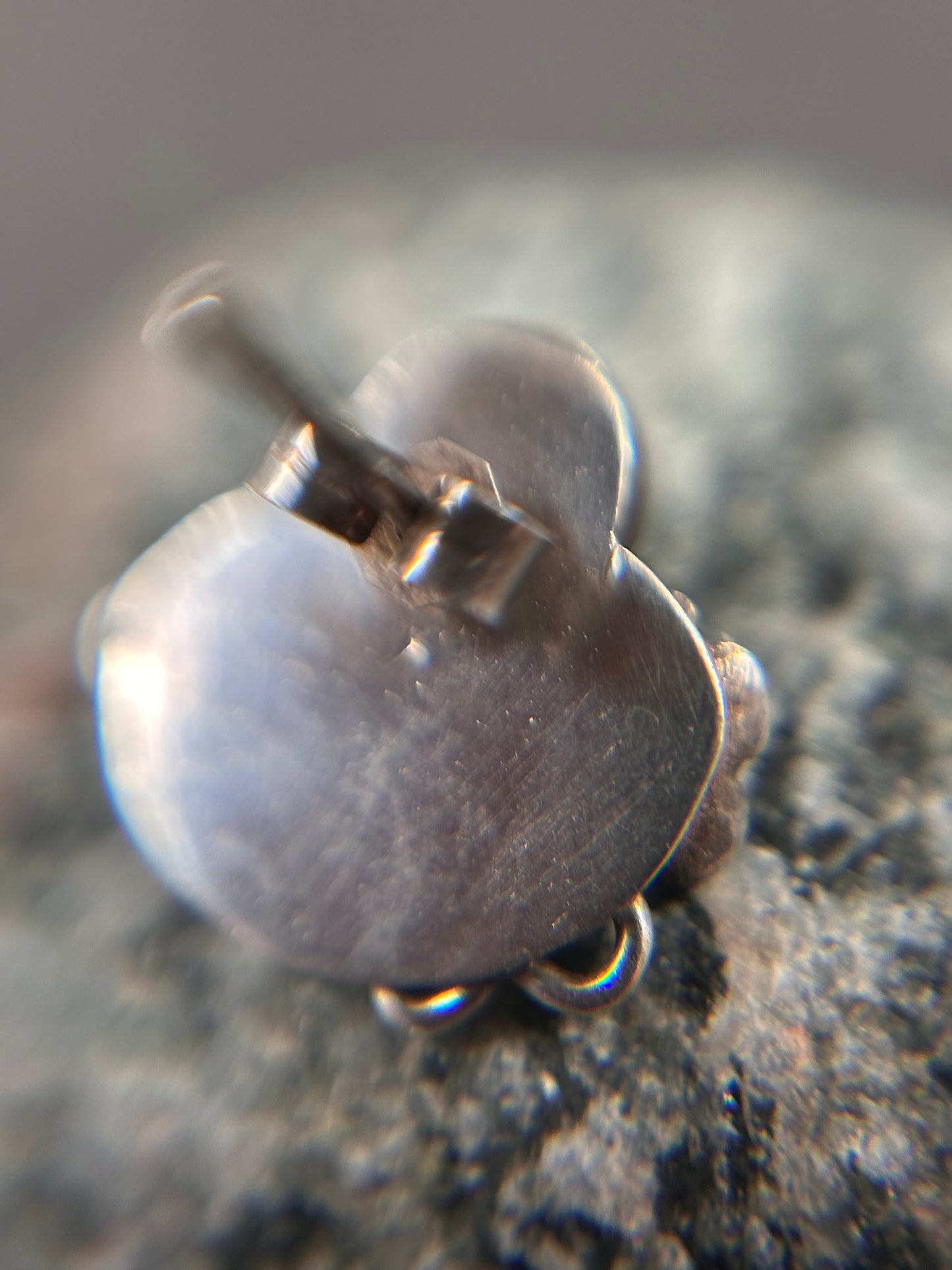Beautiful sterling silver stud earrings set with cabochon-cut amethysts.