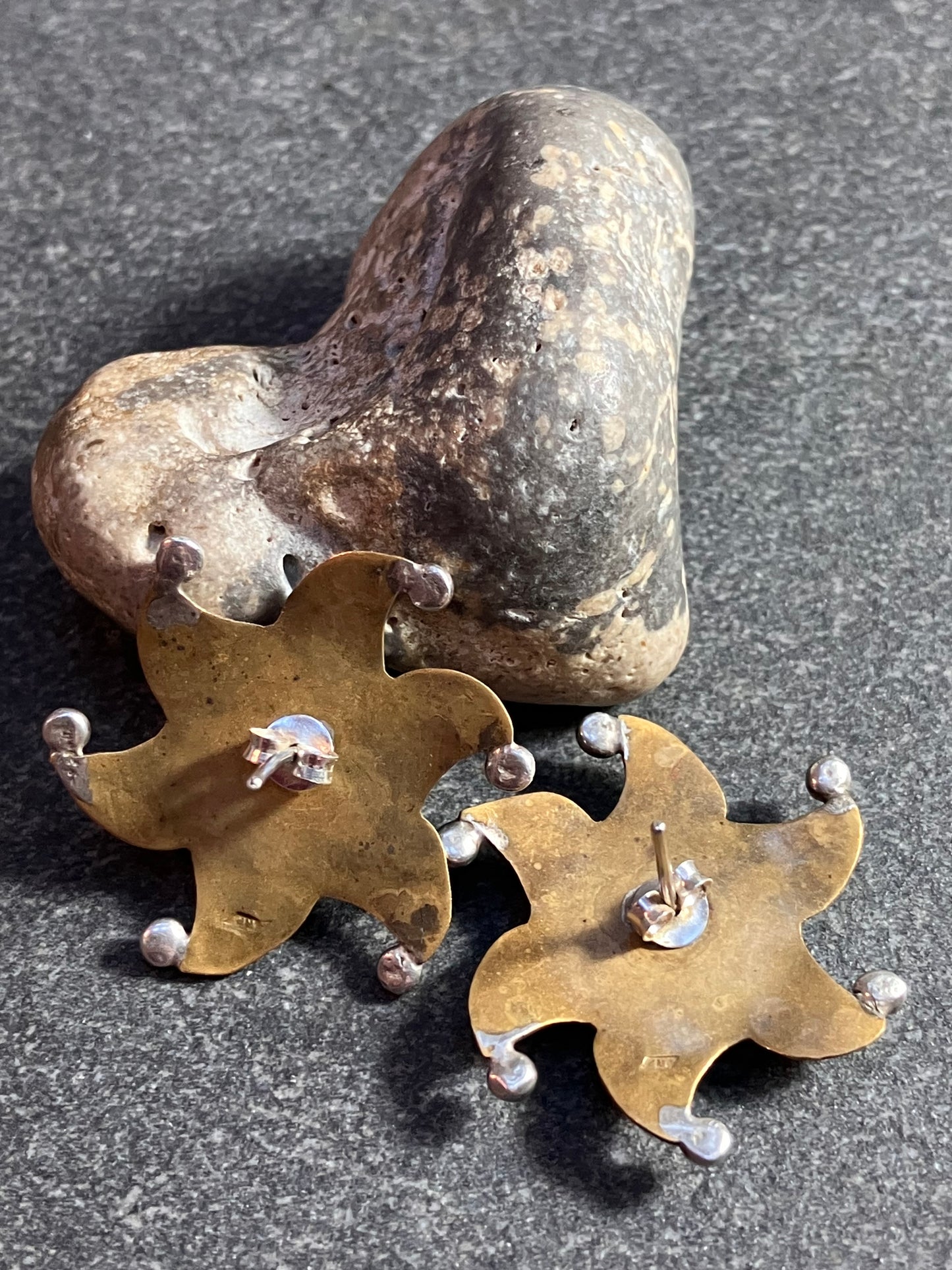 Vintage brass and sterling silver ornate star earrings.