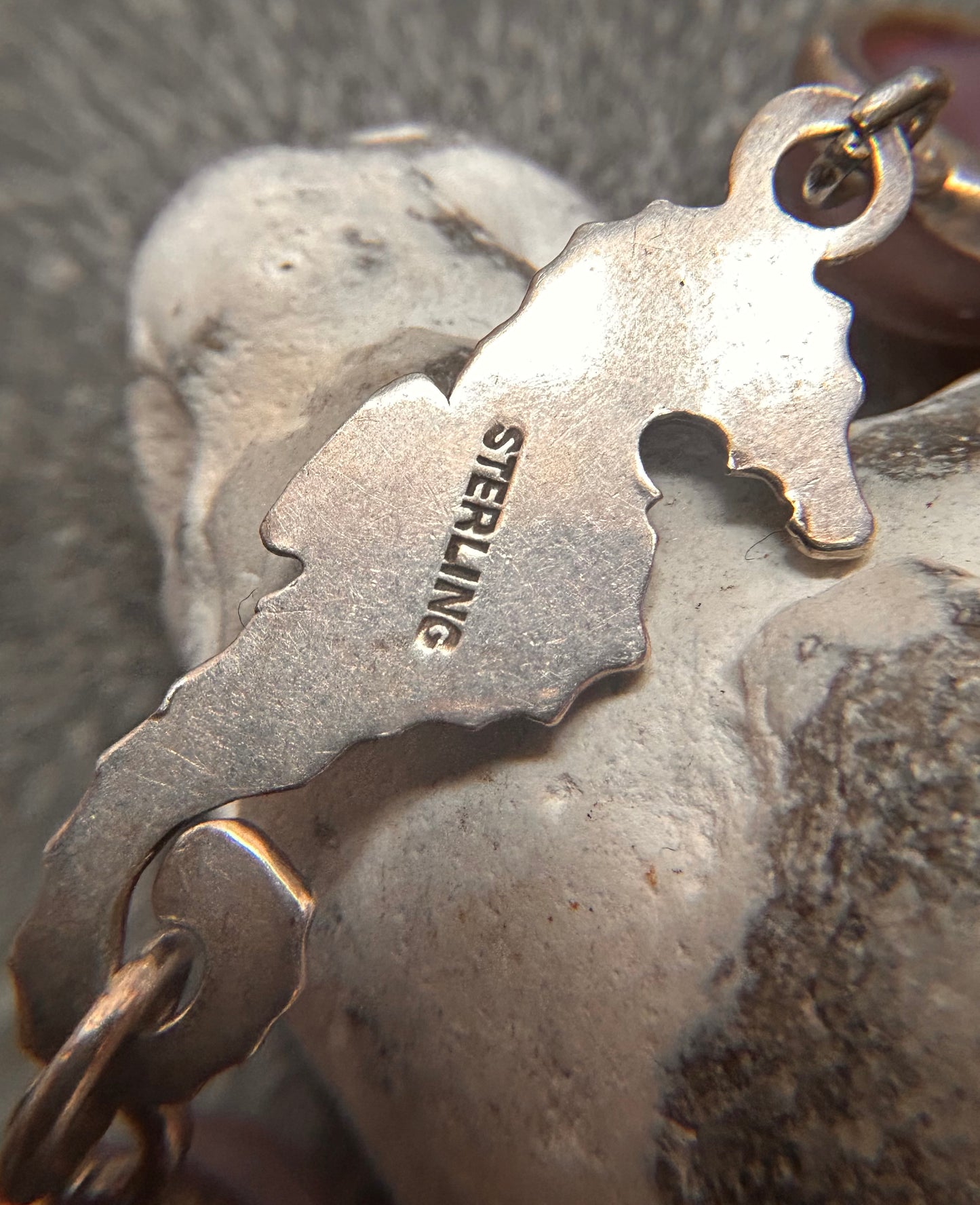 A truly enchanting vintage sterling silver bracelet, featuring four exquisitely detailed seahorses