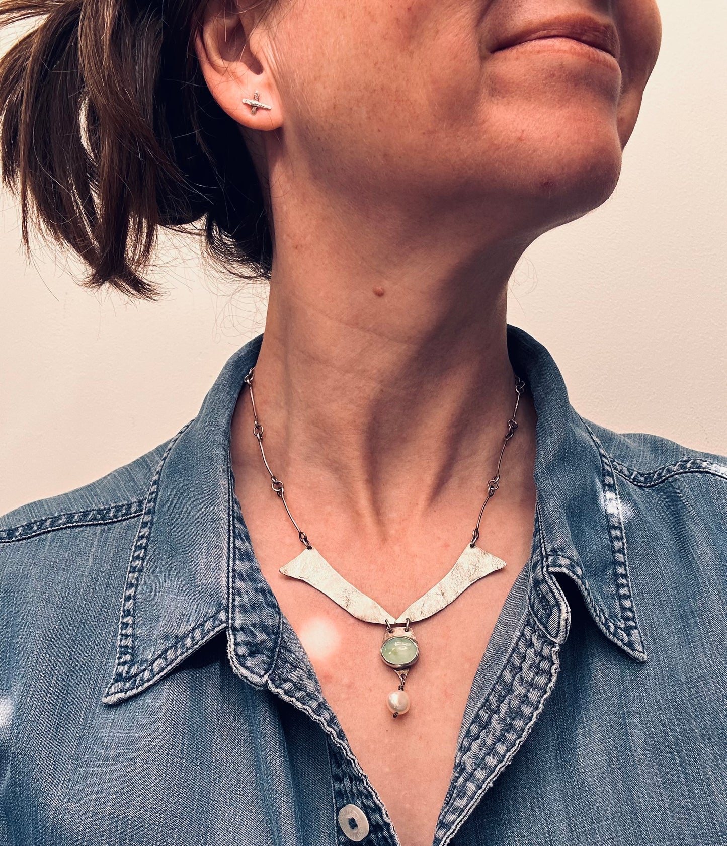 A beautifully handcrafted artisan necklace inspired by the delicate form of sycamore seeds.