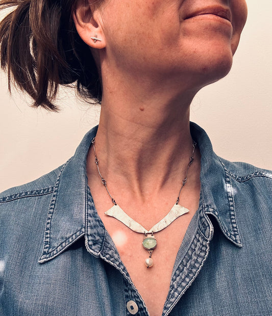 A beautifully handcrafted artisan necklace inspired by the delicate form of sycamore seeds.