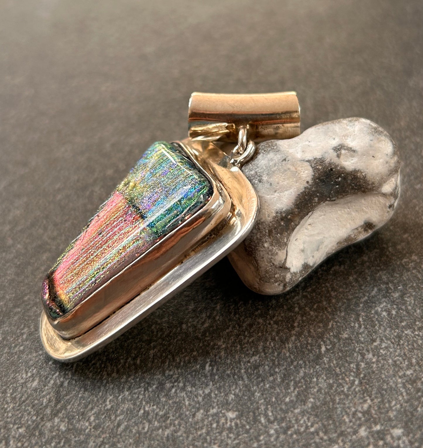 A striking vintage sterling silver dichroic glass pendant in an exceptional large statement size