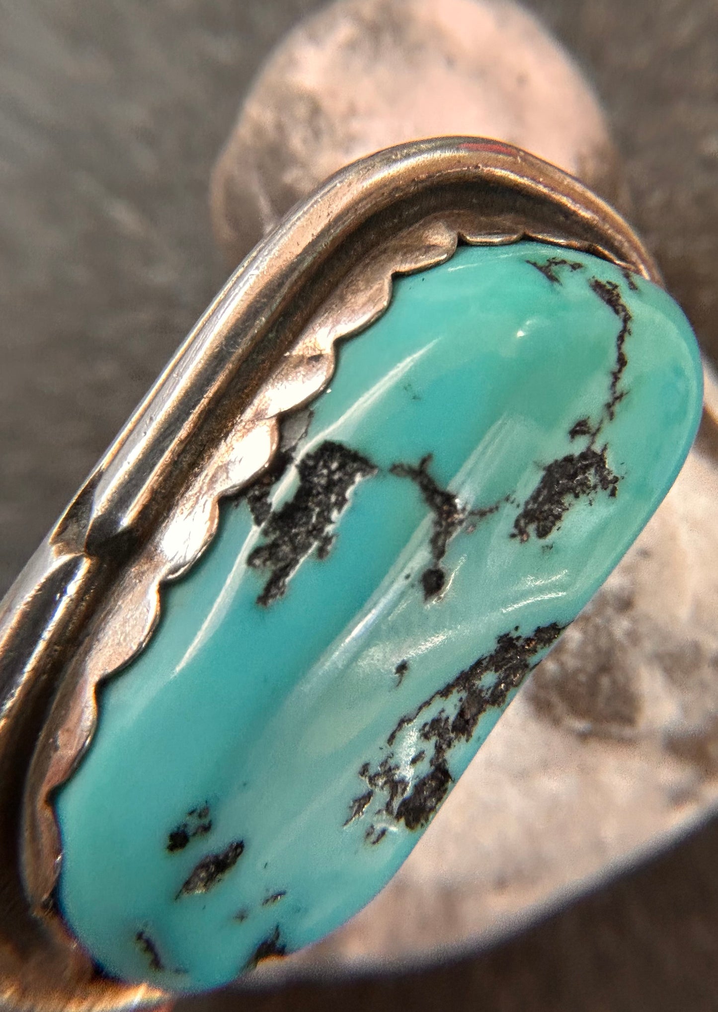 Beautiful vintage Native American sterling silver earrings featuring striking turquoise cabochons and feathers.