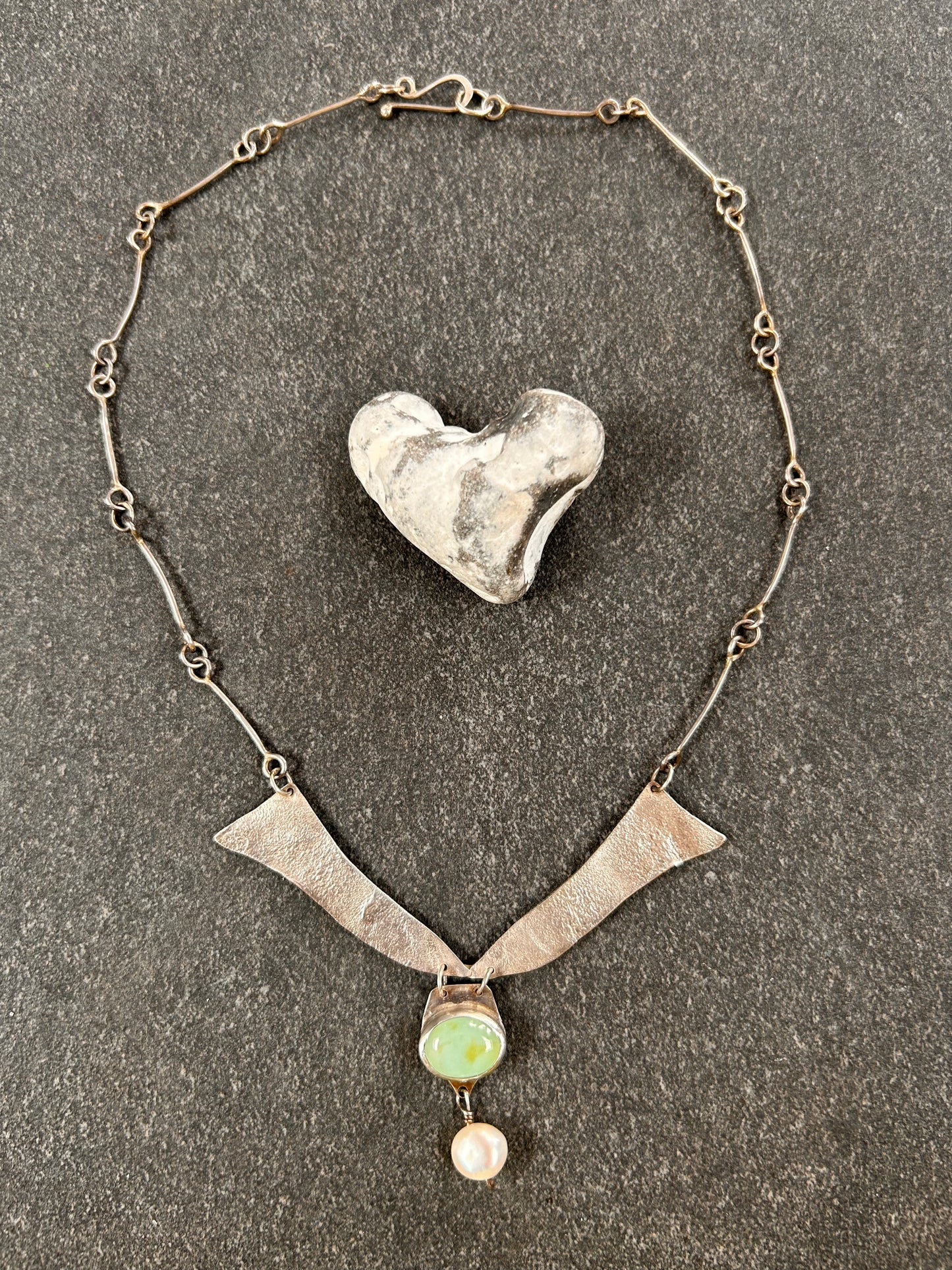 A beautifully handcrafted artisan necklace inspired by the delicate form of sycamore seeds.